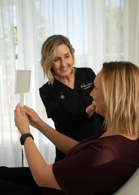 Andrea Harris going through results with a client during a consultation