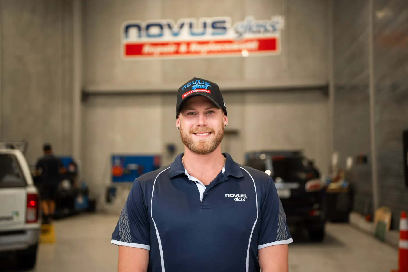NOVUS Glass technician smiling in the workshop