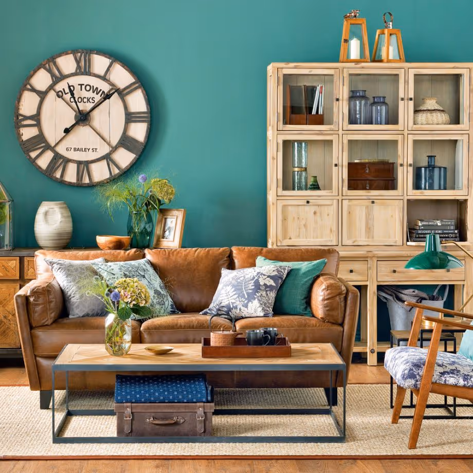 Living Room Design with wood and metal added with an area rug.  