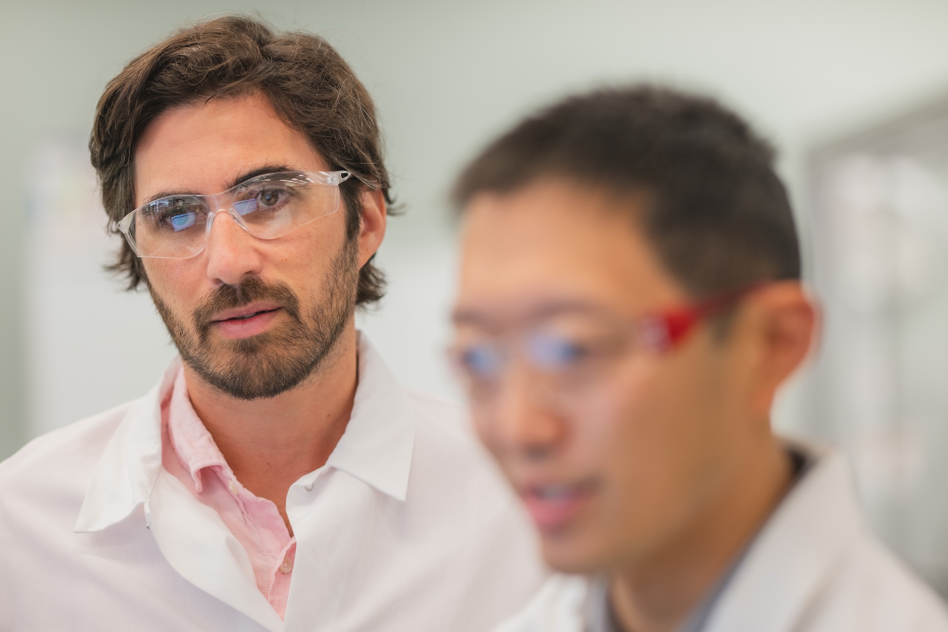 Scientists discussing chemistry in the laboratory