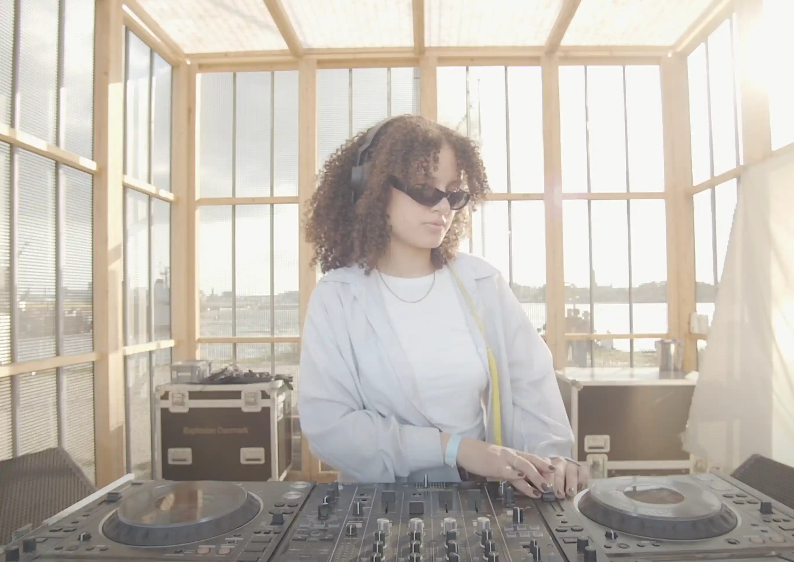 Téa performing a DJ set at Drift Radio during O Days Festival on August 2, 2024 — focused behind the decks, surrounded by lights and festival energy.