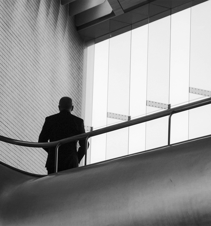 Executive walking through a modern office building