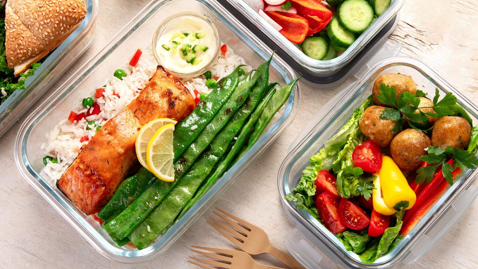 Healthcare professional showing a patient a meal plan on a tablet — illustrating nutrition interventions for chronic disease care