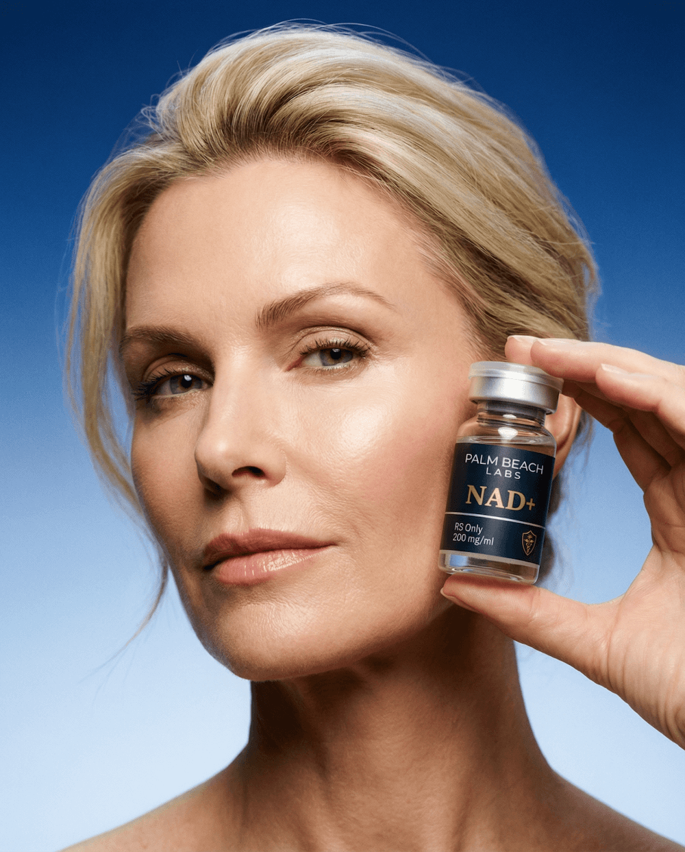 Woman with NAD+ product closeup