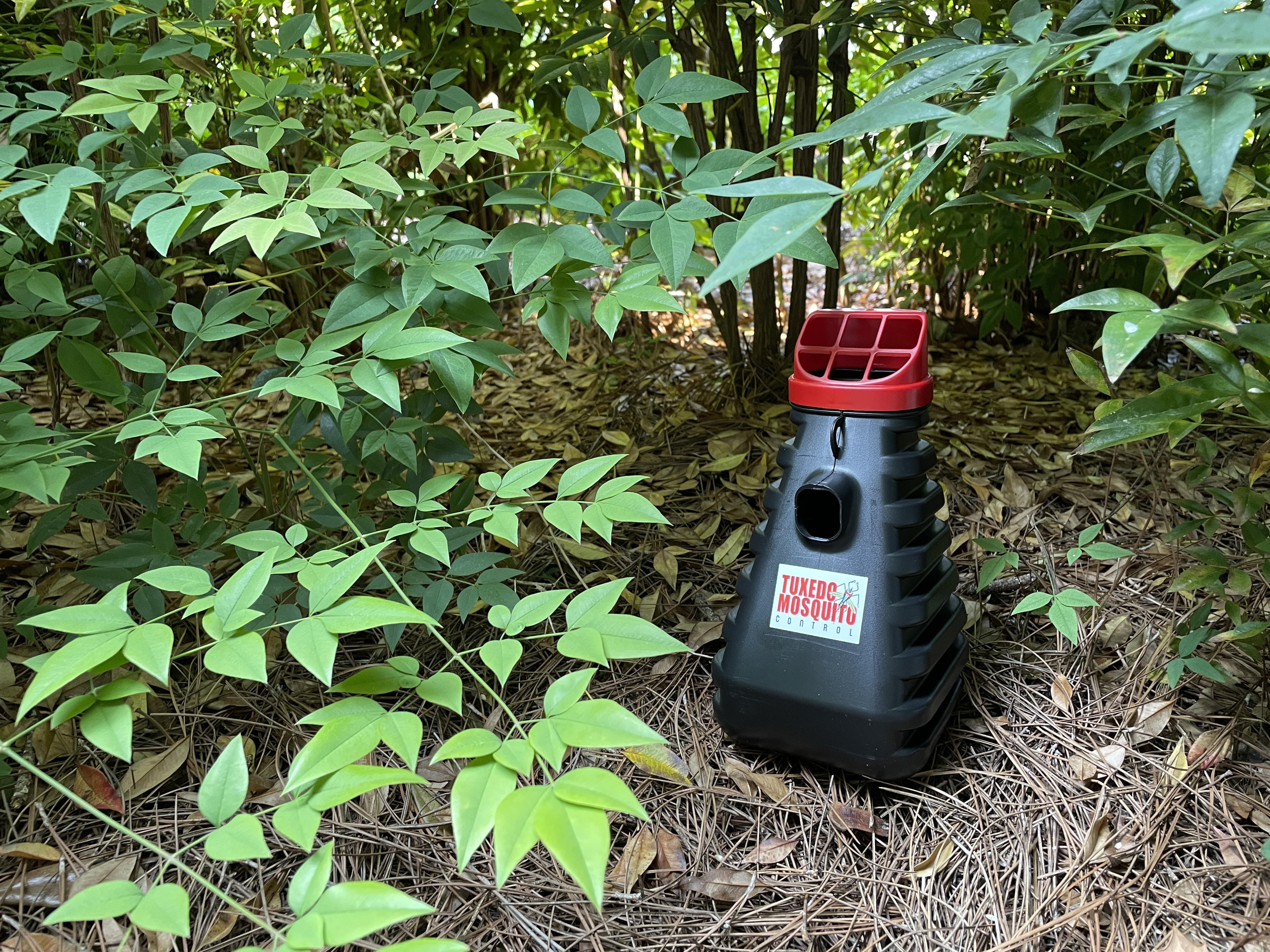 Tuxedo Mosquito Control trap placed in landscaping