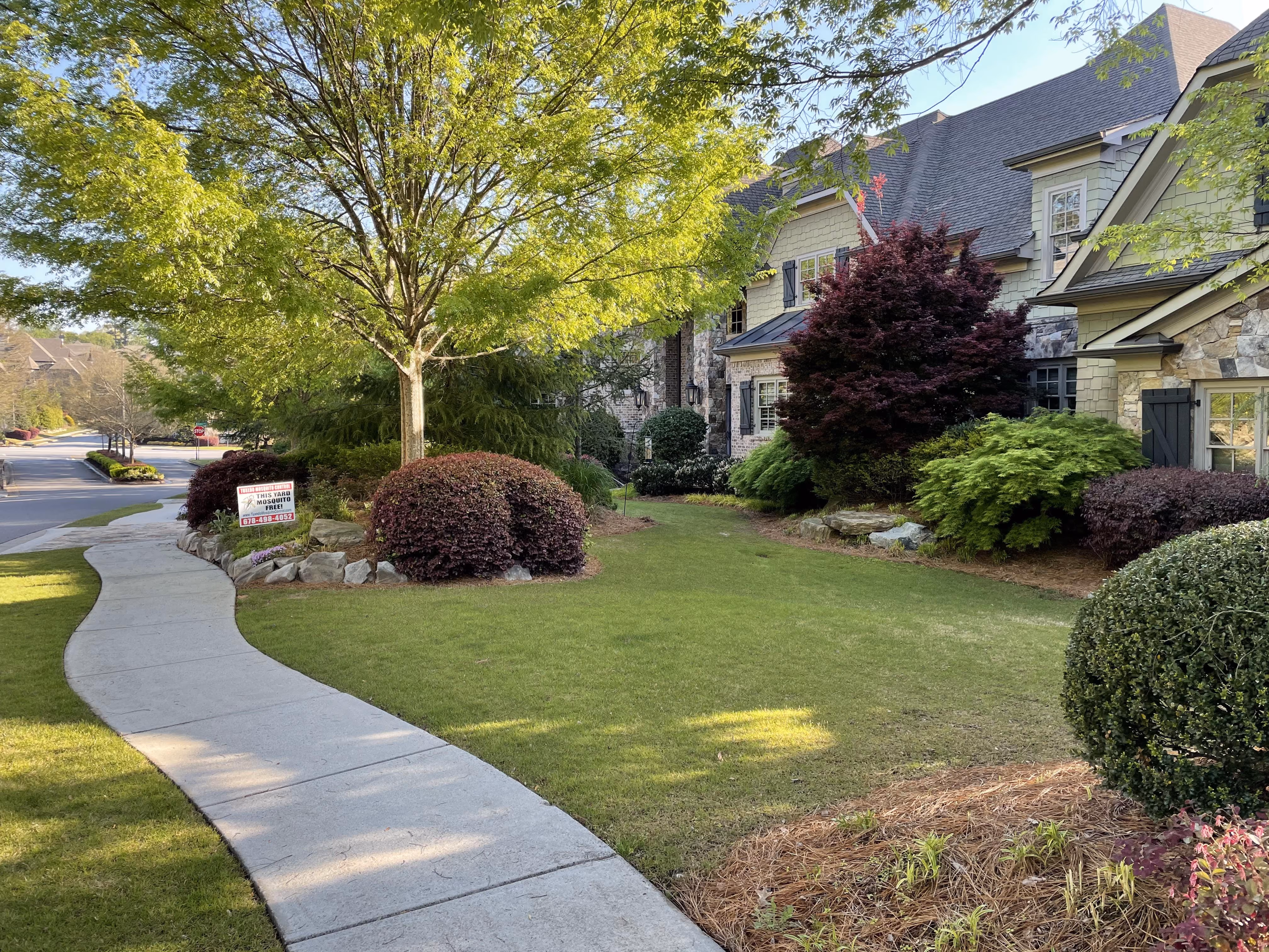 Atlanta home with professionally maintained landscaping