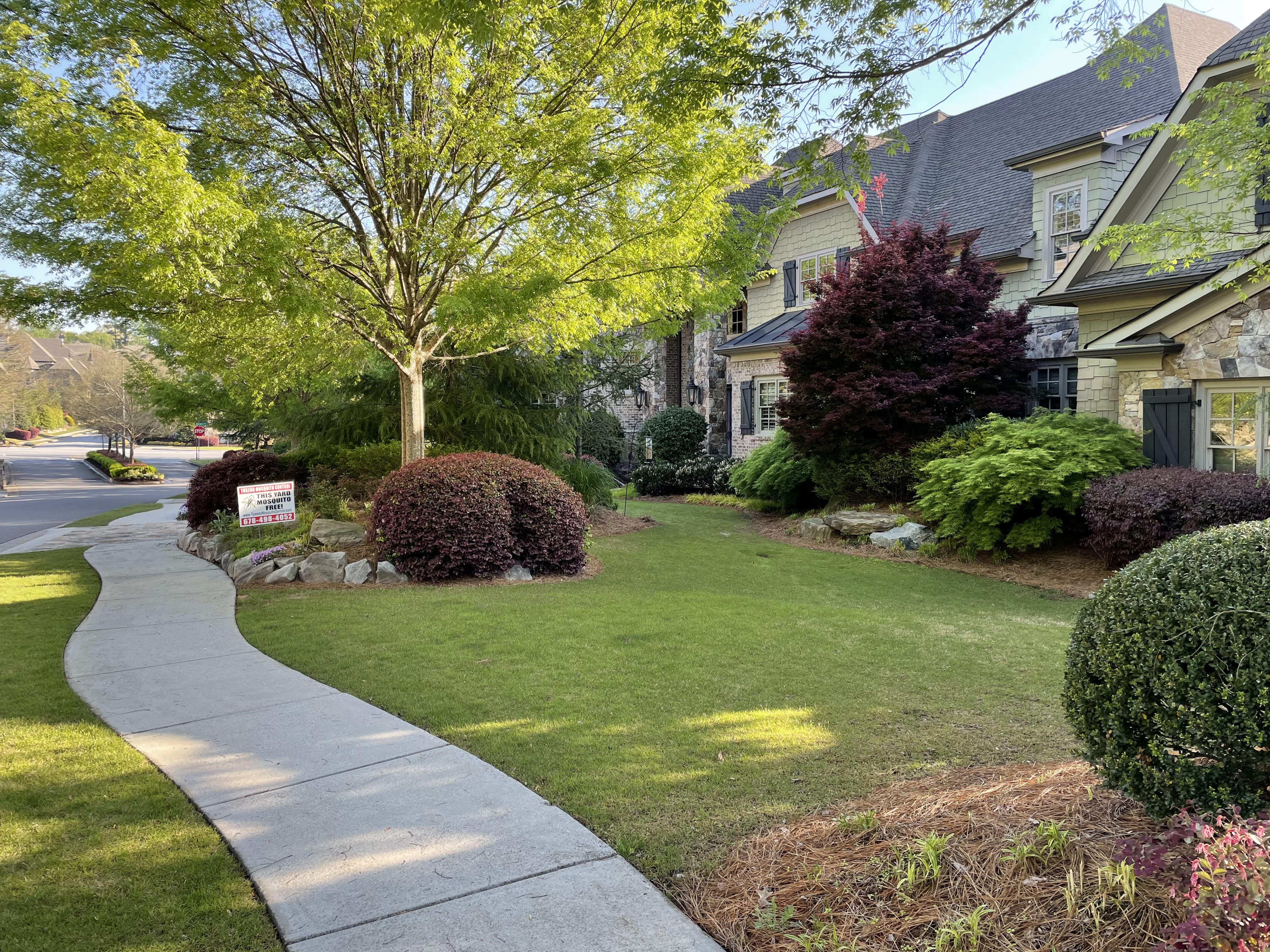 Atlanta home with professionally maintained landscaping