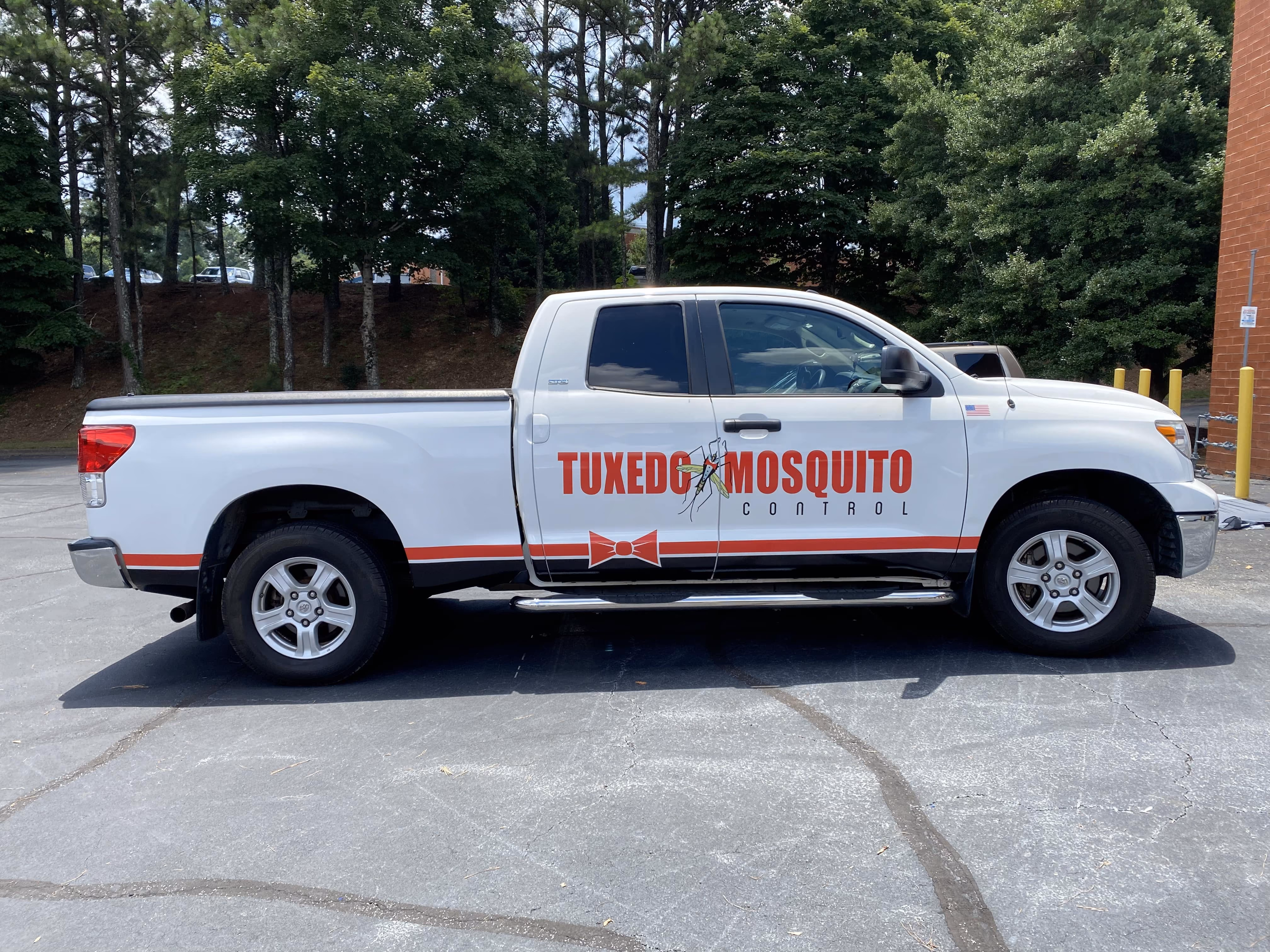 Tuxedo Mosquito Control branded service truck