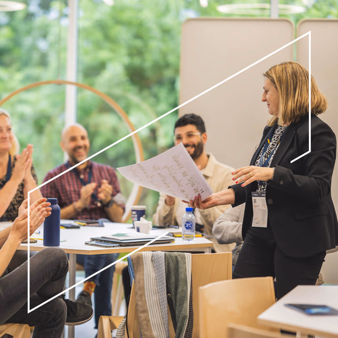 Teacher explaining something to a team