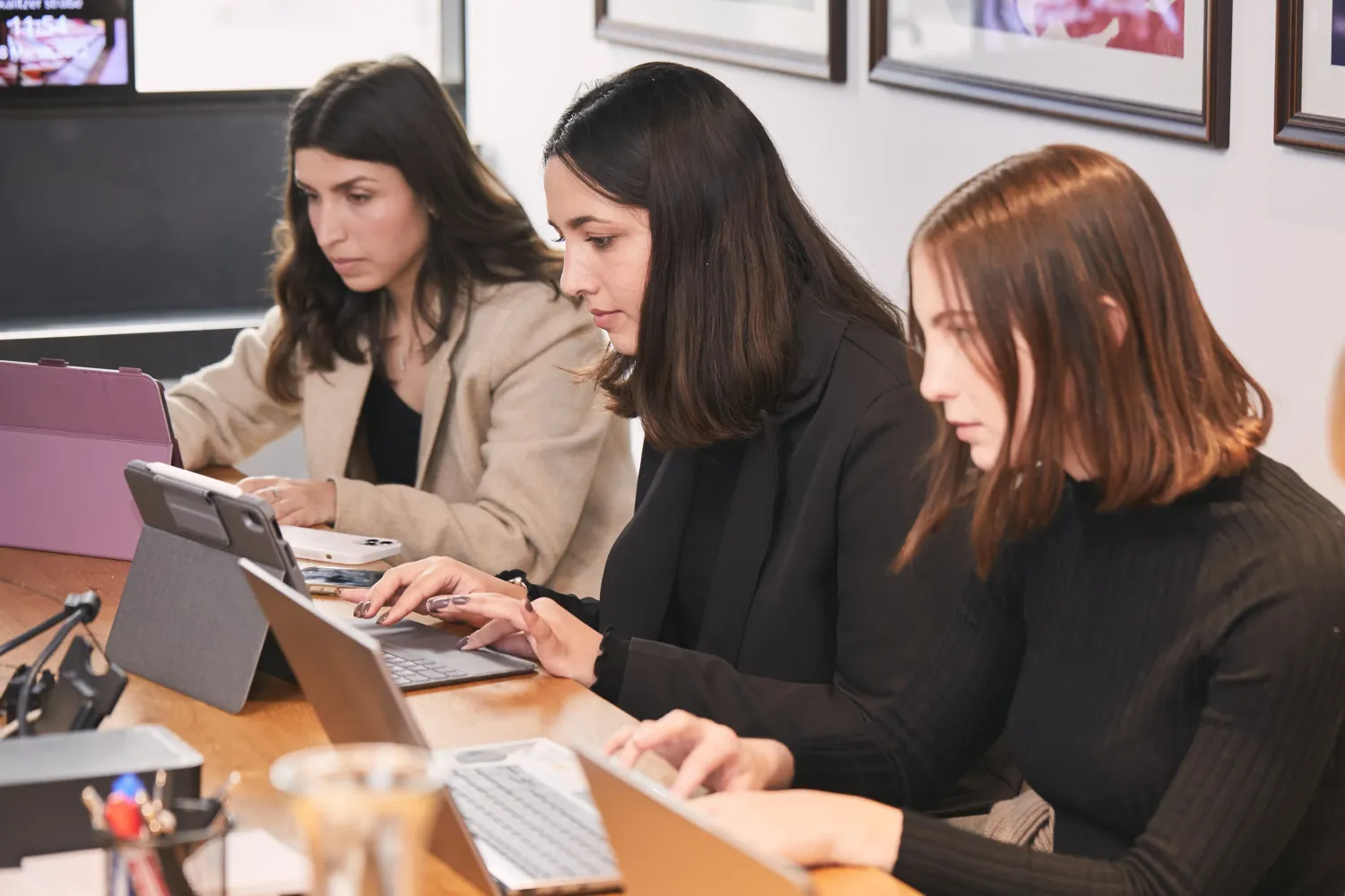 Four co-workers conversing