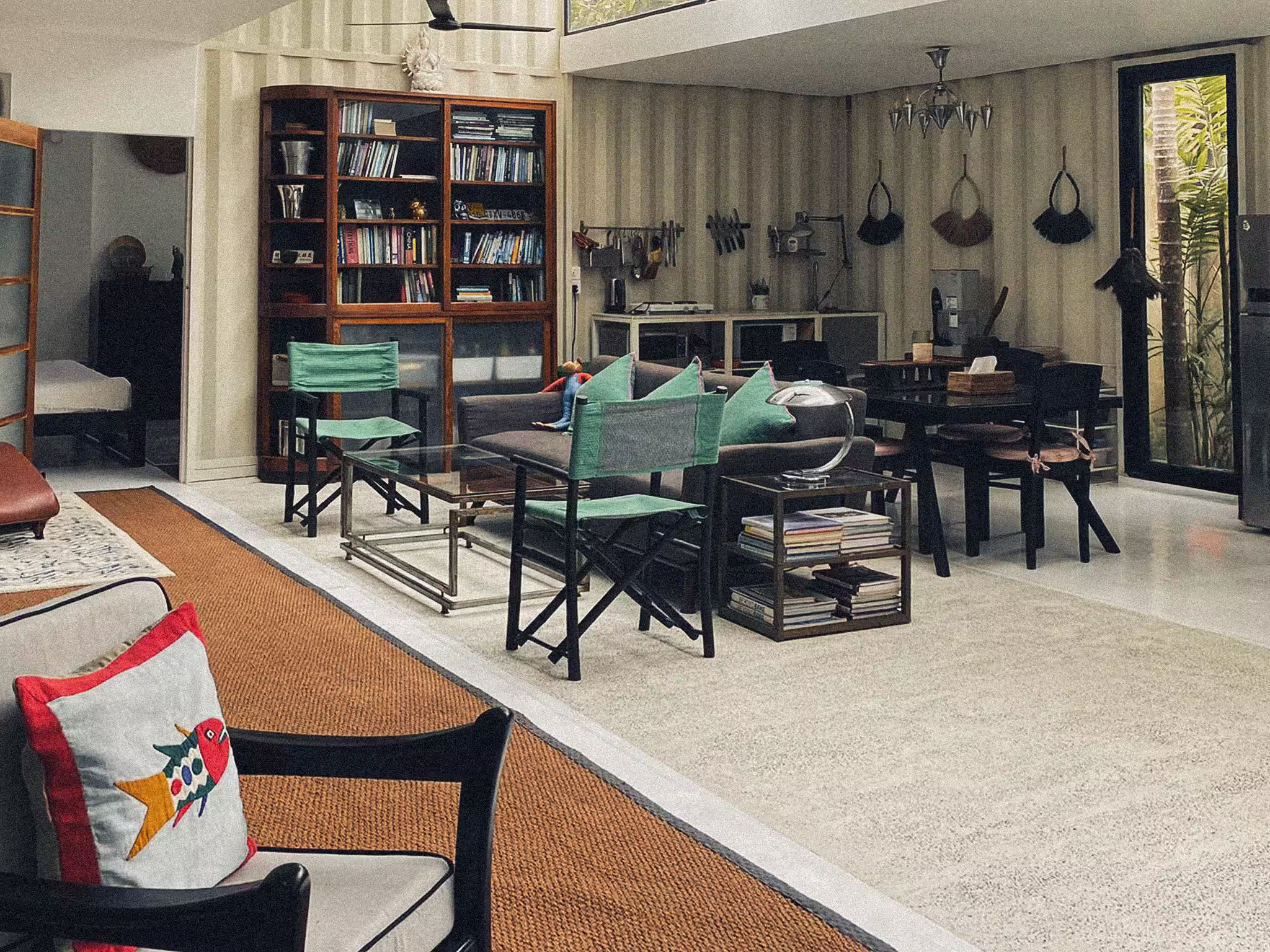 Tropical retreat with full glass frontage bringing nature indoors