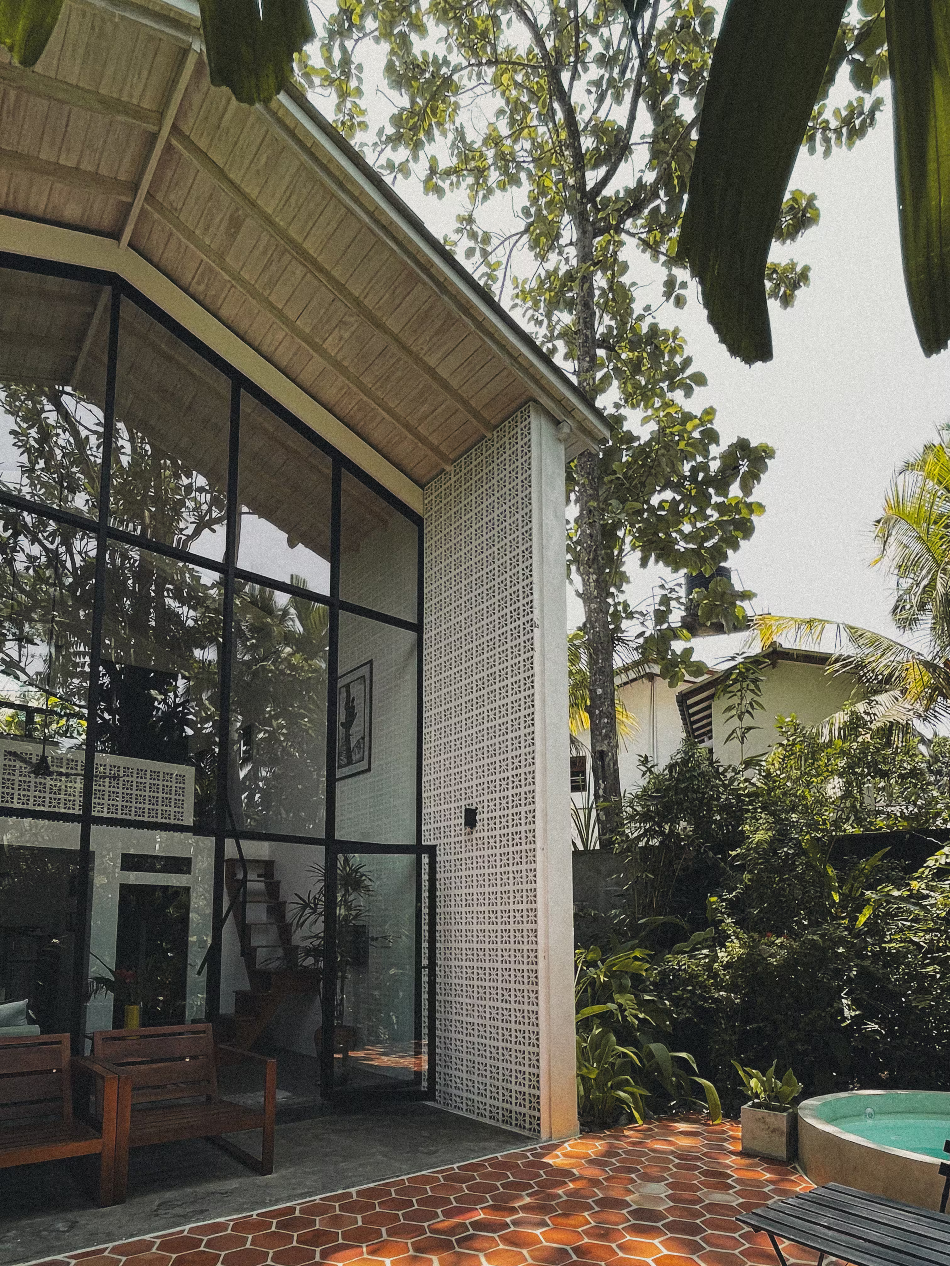 Modern minimalist house with plunge pool and serene tropical setting