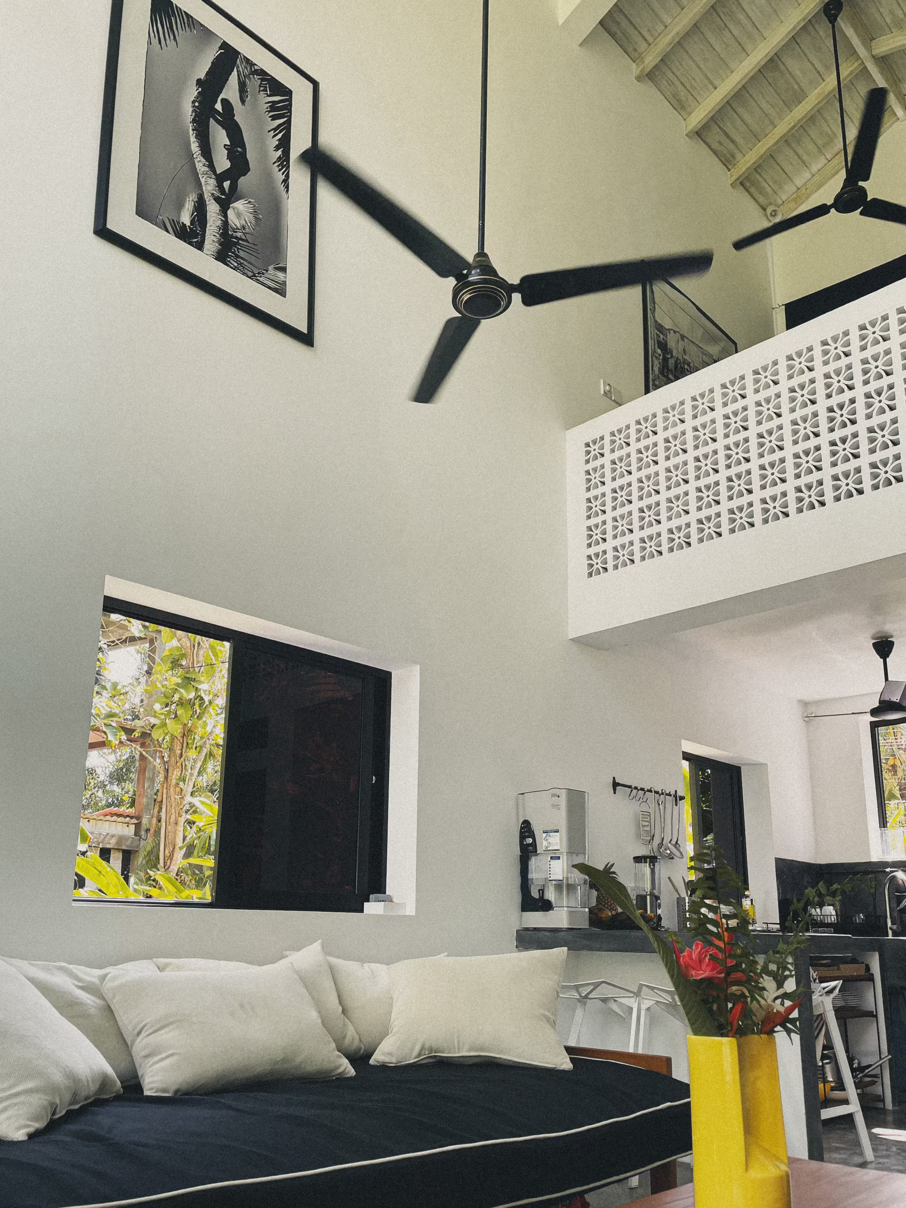 Private tiled patio with plunge pool surrounded by tropical foliage