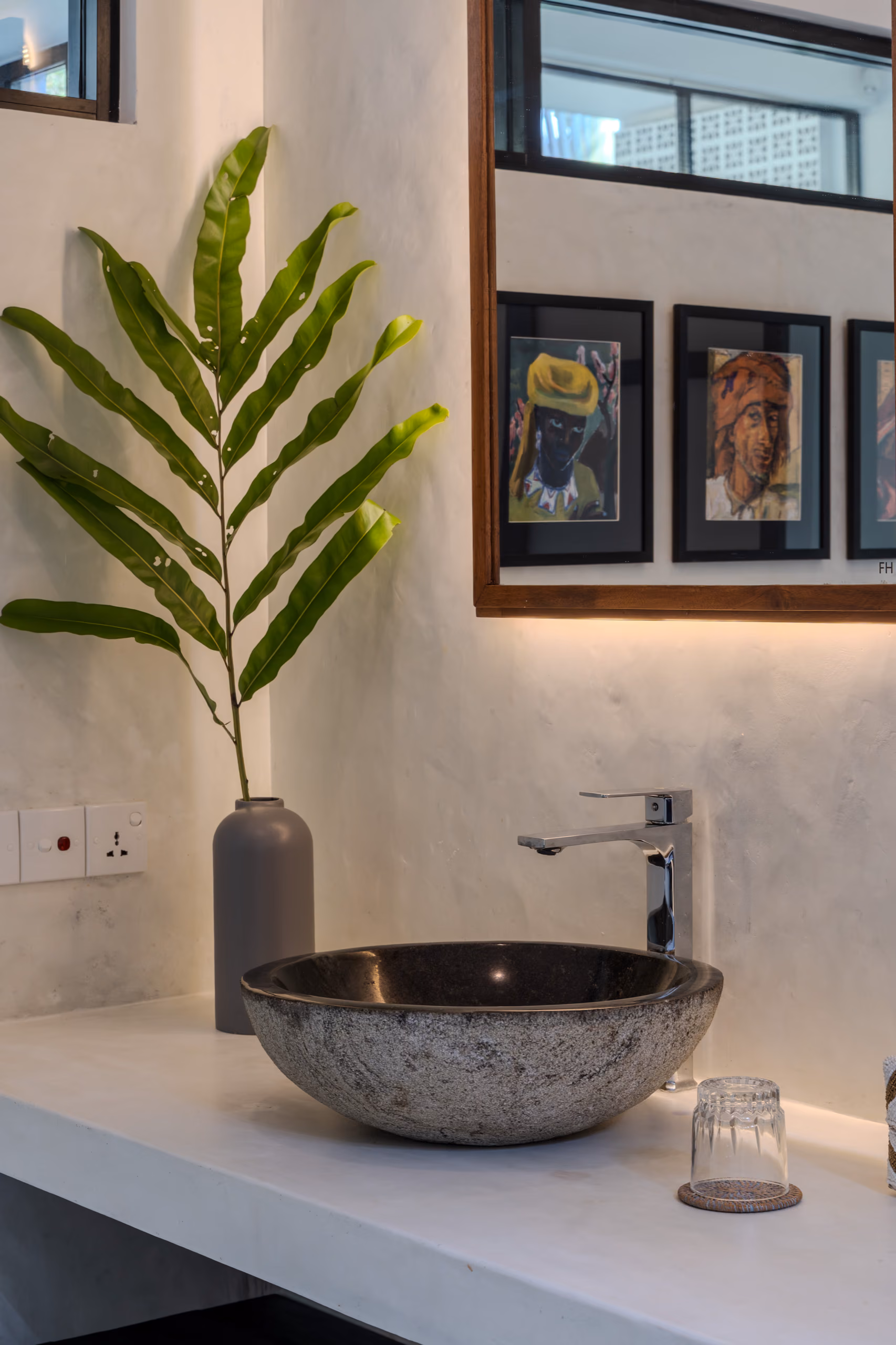 Stone vessel sink and palm detail in the Garden House bathroom at Licuala Lanka near Kabalana Beach, Sri Lanka