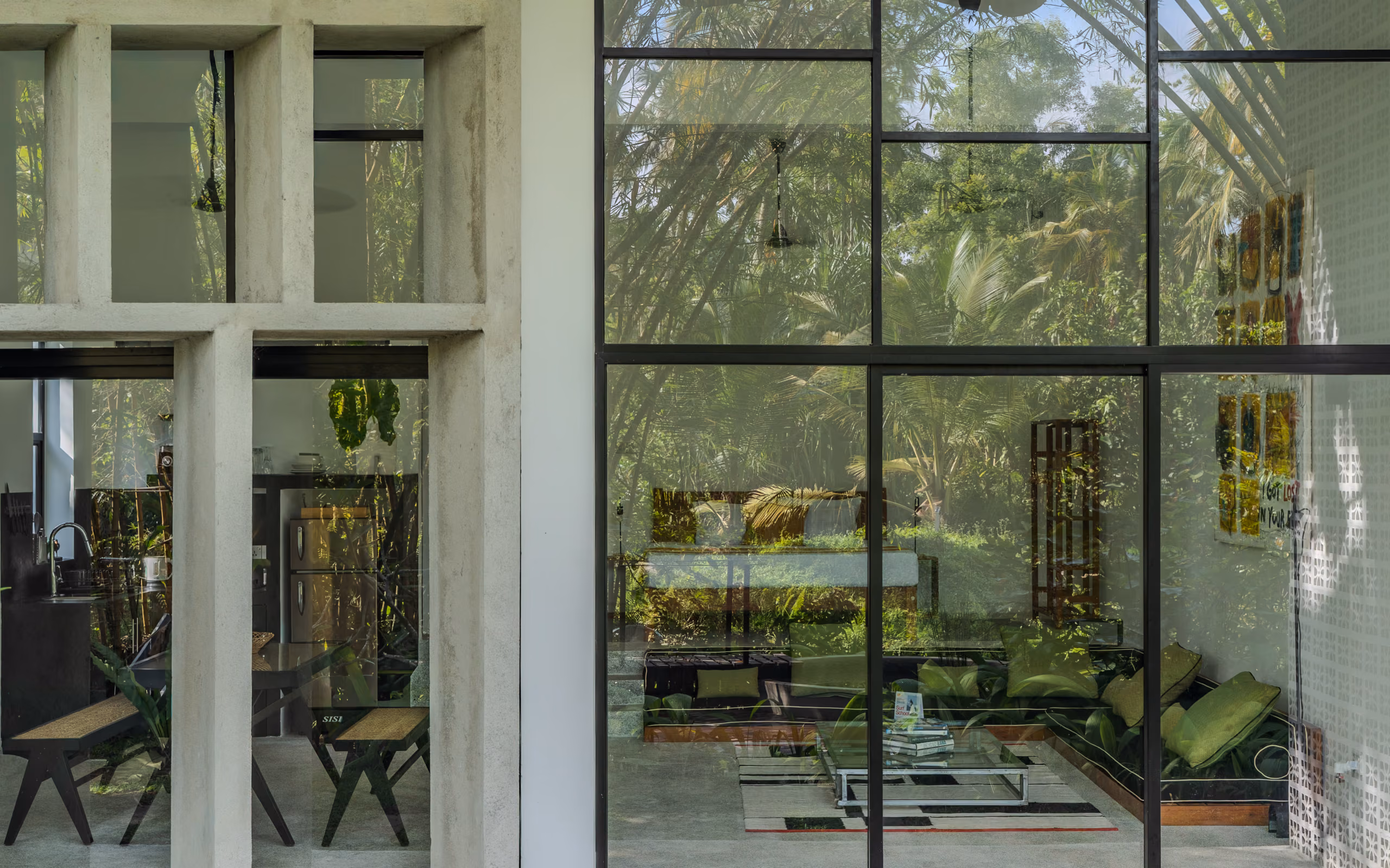Glass facade of the Garden House opening to the jungle garden at Licuala Lanka, Ahangama, Sri Lanka