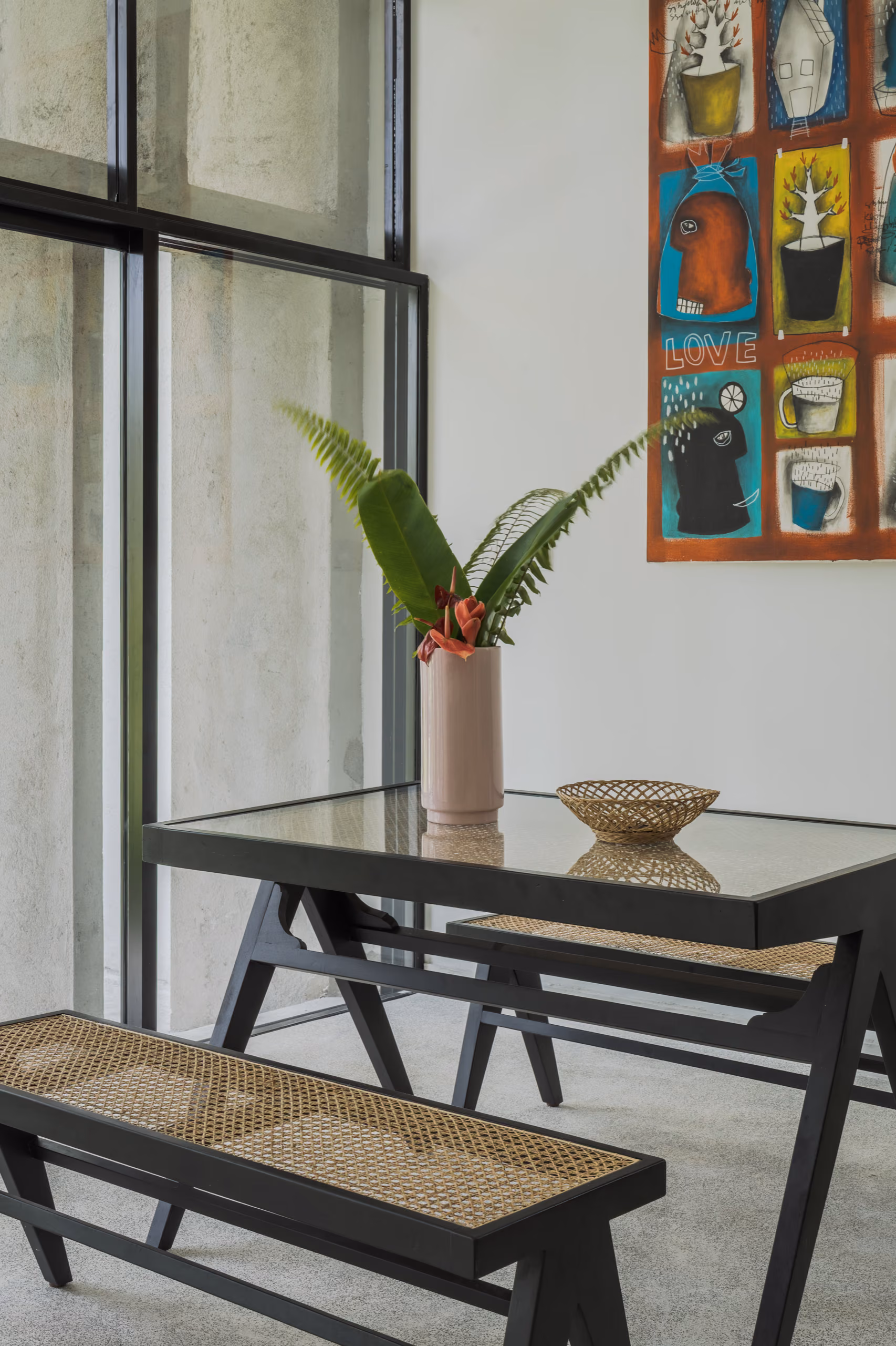 Dining corner with fern and framed art in the Garden House, Licuala Lanka, Ahangama, Sri Lanka