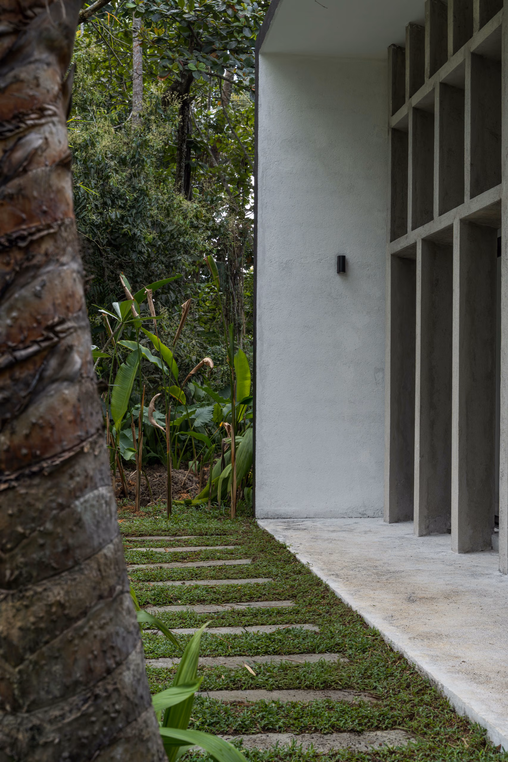 Stepping-stone path to the Garden House facade at Licuala Lanka, Ahangama on Sri Lanka's South Coast