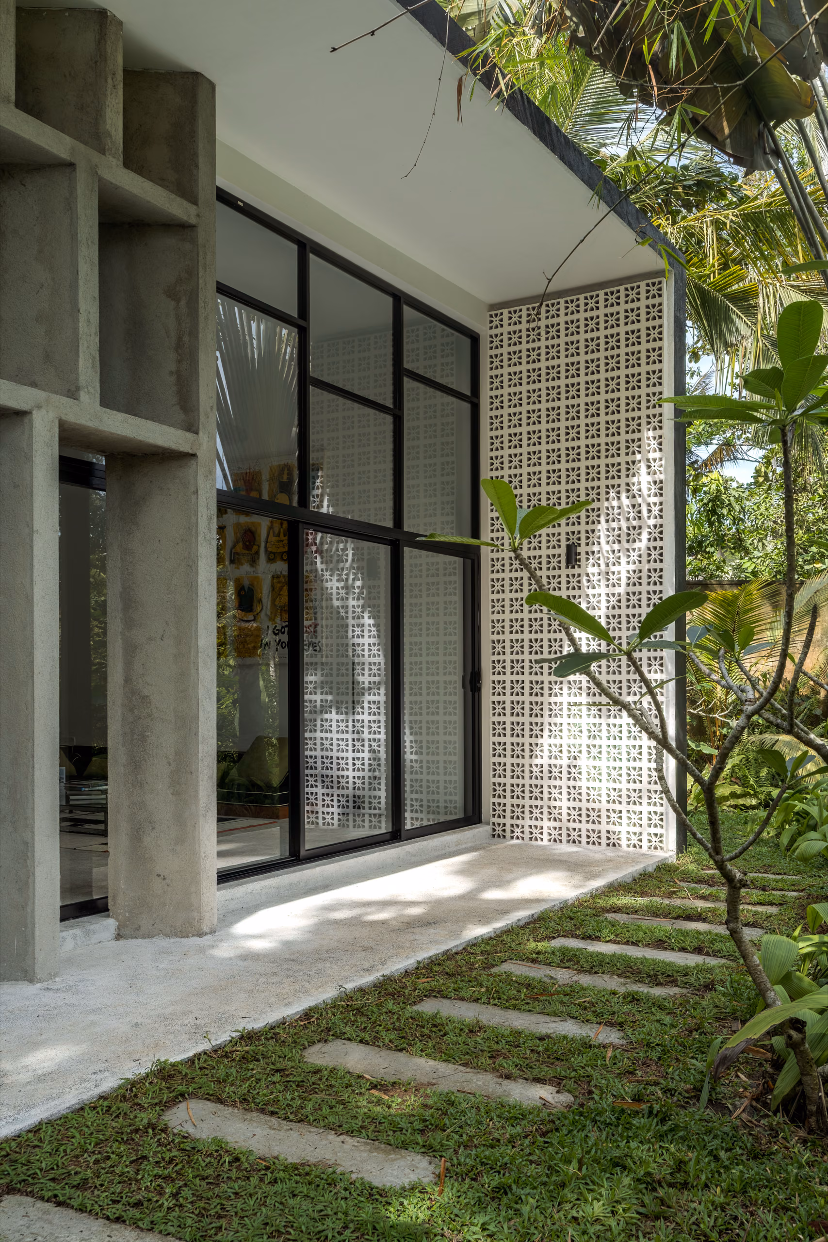 Concrete facade detail with stepping stones at the Garden House, Licuala Lanka near Kabalana Beach, Sri Lanka