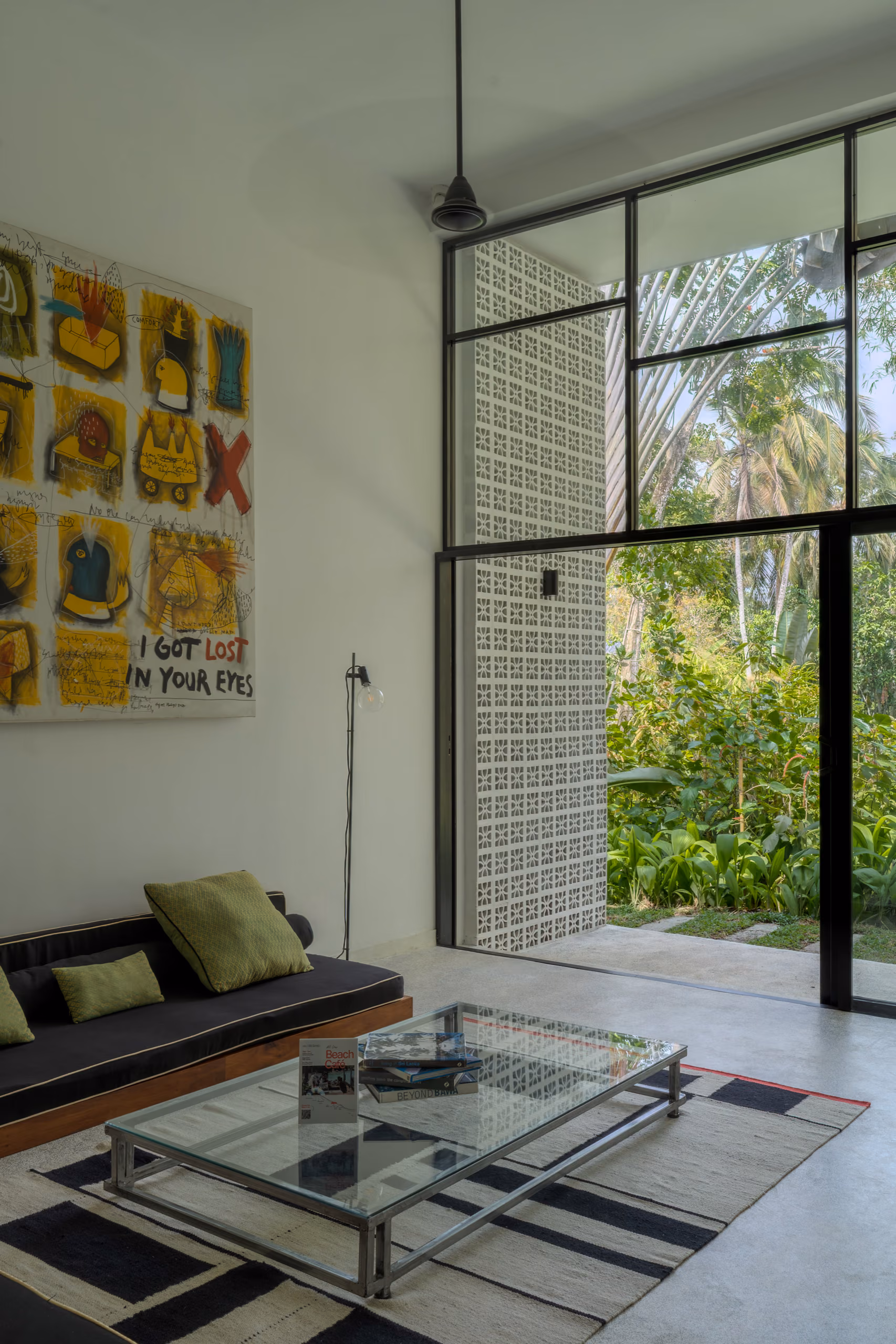 Lounge seating with jungle garden view inside the Garden House at Licuala Lanka on Sri Lanka's South Coast