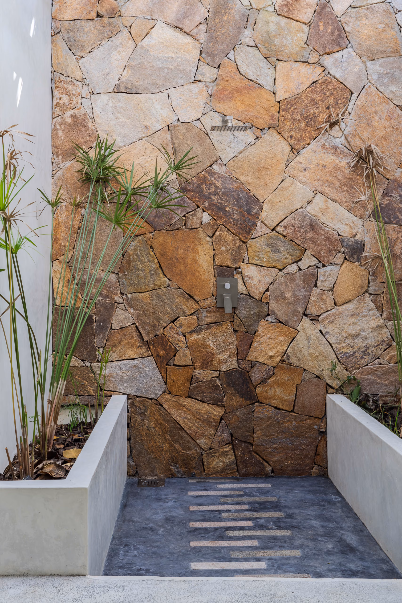 Natural stone feature wall and garden path at the Garden House, Licuala Lanka on Sri Lanka's South Coast