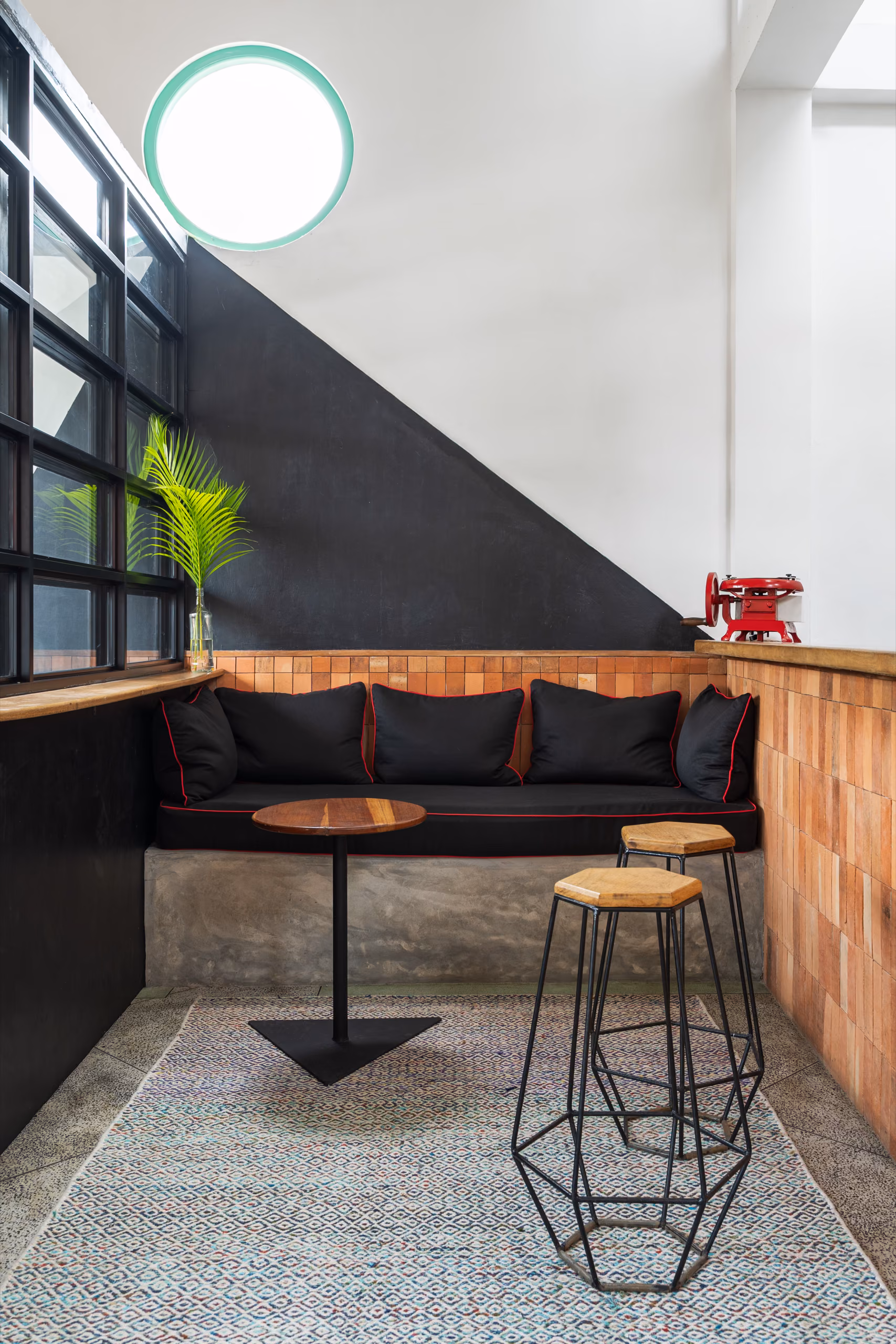 Lounge nook with wood-clad bar in the Surf Loft, Kabalana, Sri Lanka
