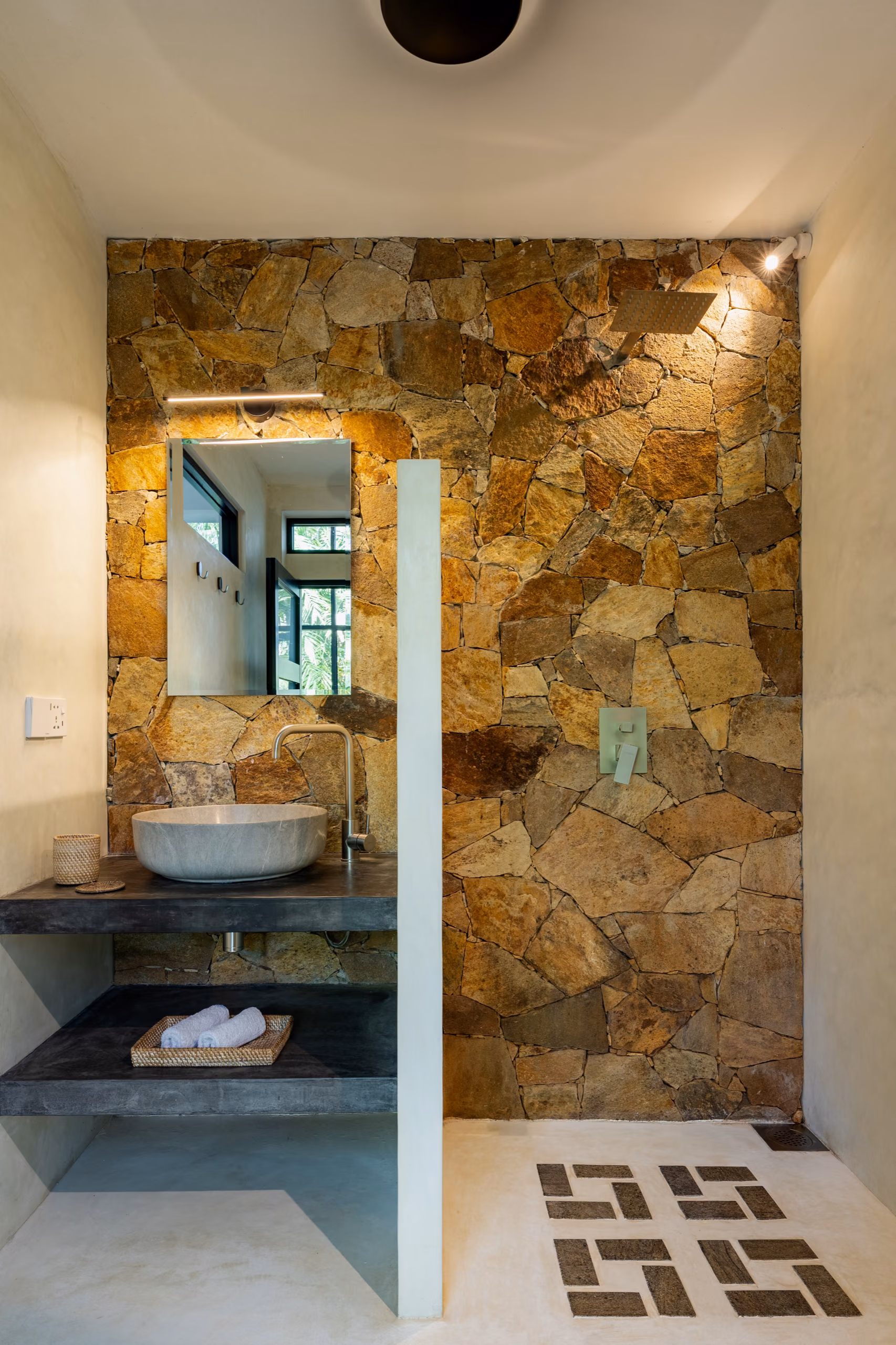Natural stone bathroom with basin in the Tropical House, Licuala Lanka near Kabalana Beach, Sri Lanka