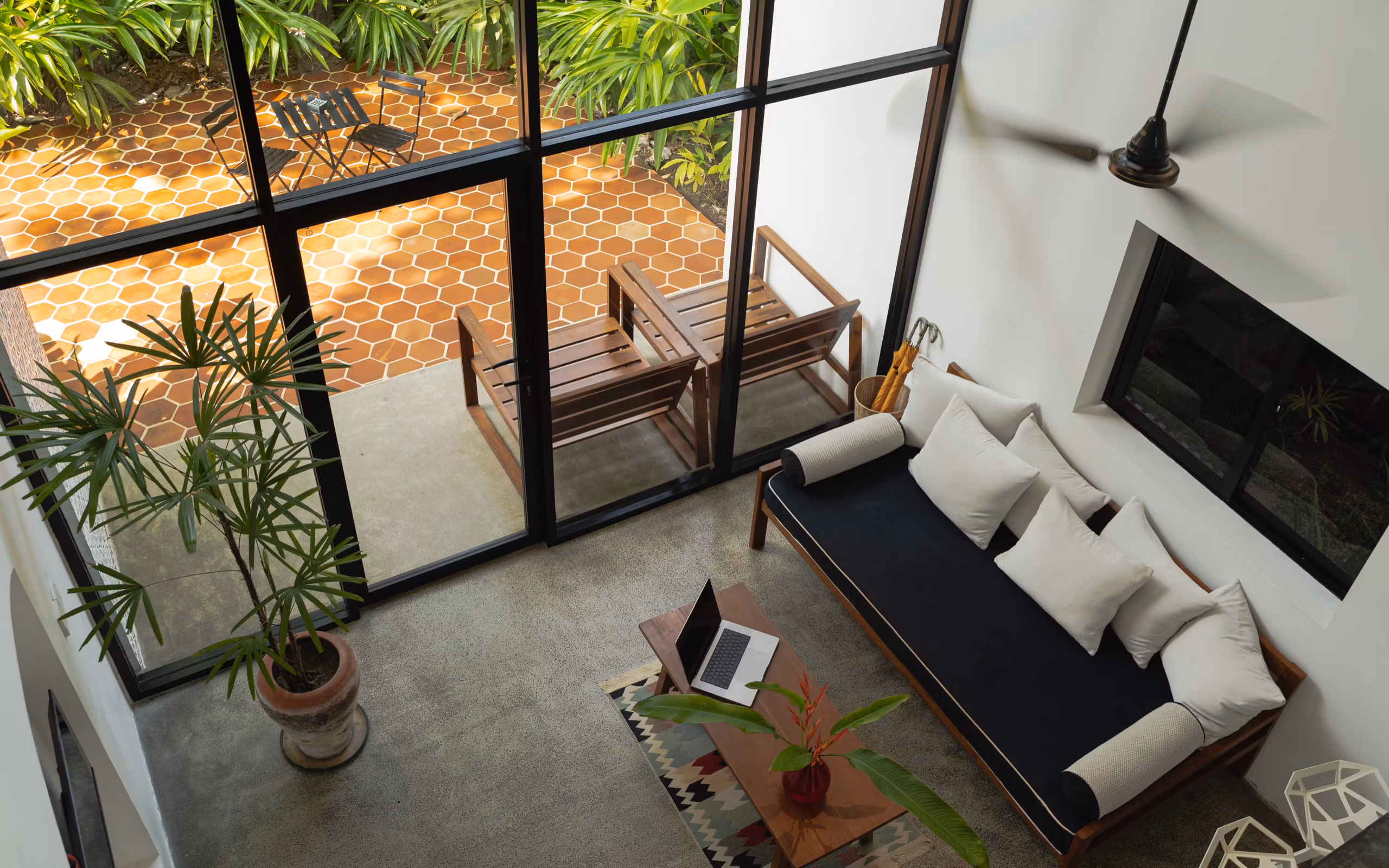 View from the mezzanine bedroom over the Tropical House patio, Licuala Lanka on Sri Lanka's South Coast