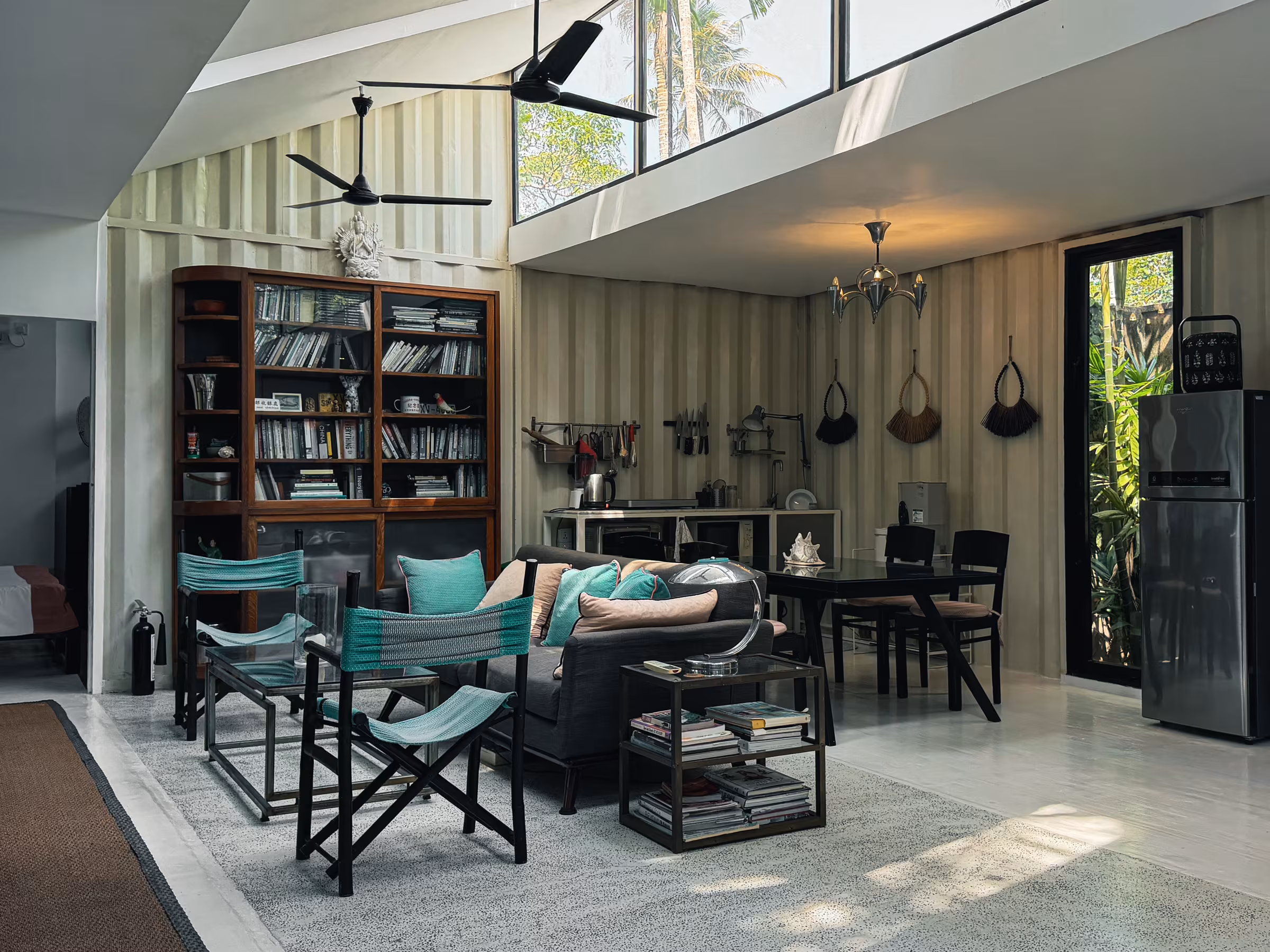 Living room with library shelves in the Jungle Home at Licuala Lanka, Ahangama, Sri Lanka