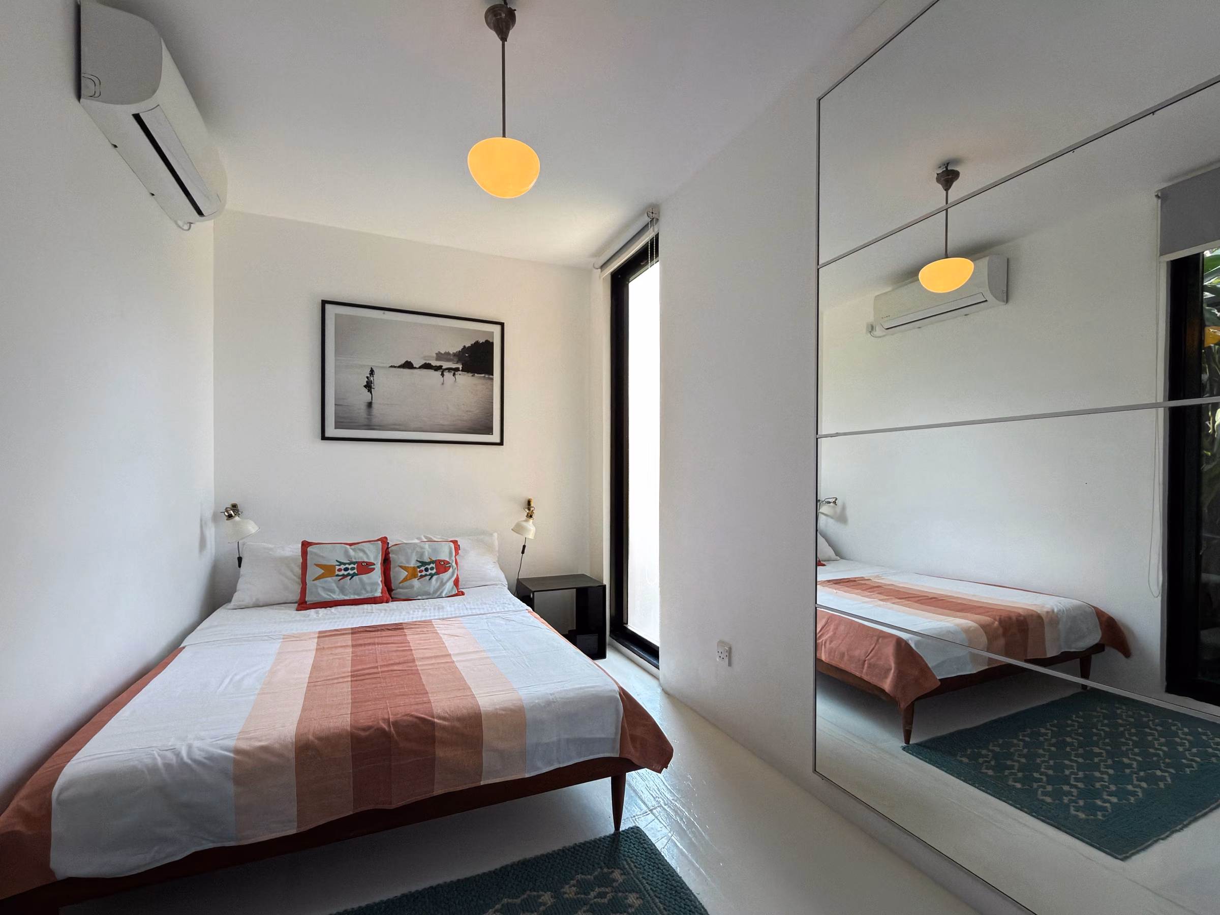 Queen bedroom with mirror in the Jungle Home at Licuala Lanka, Ahangama on Sri Lanka's South Coast