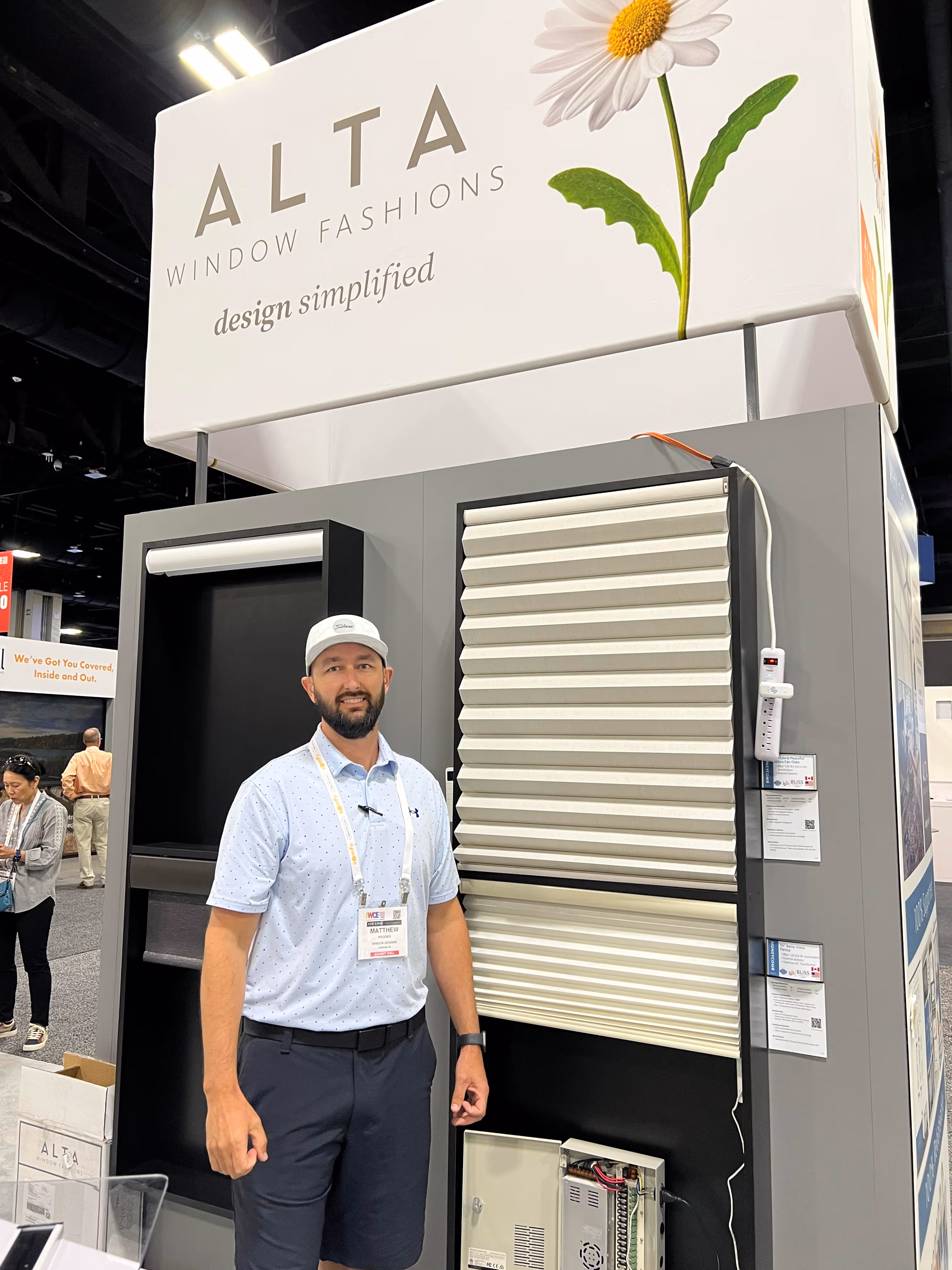 Matt Brooks standing in front of window display