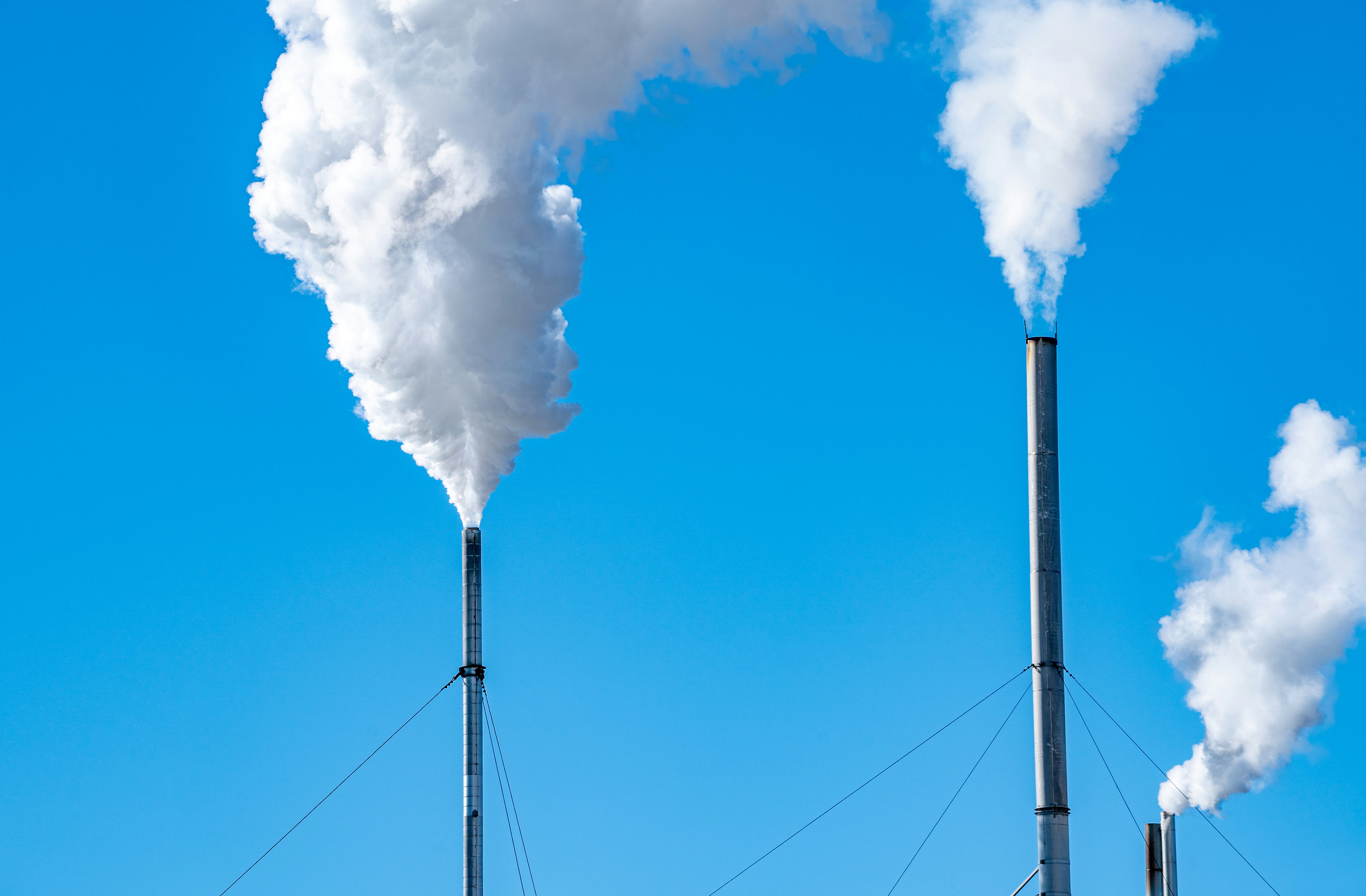 Factory smoke into a blue sky