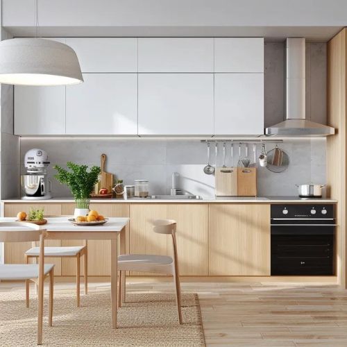 Minimalist kitchen with light wood cabinetry and built-in oven