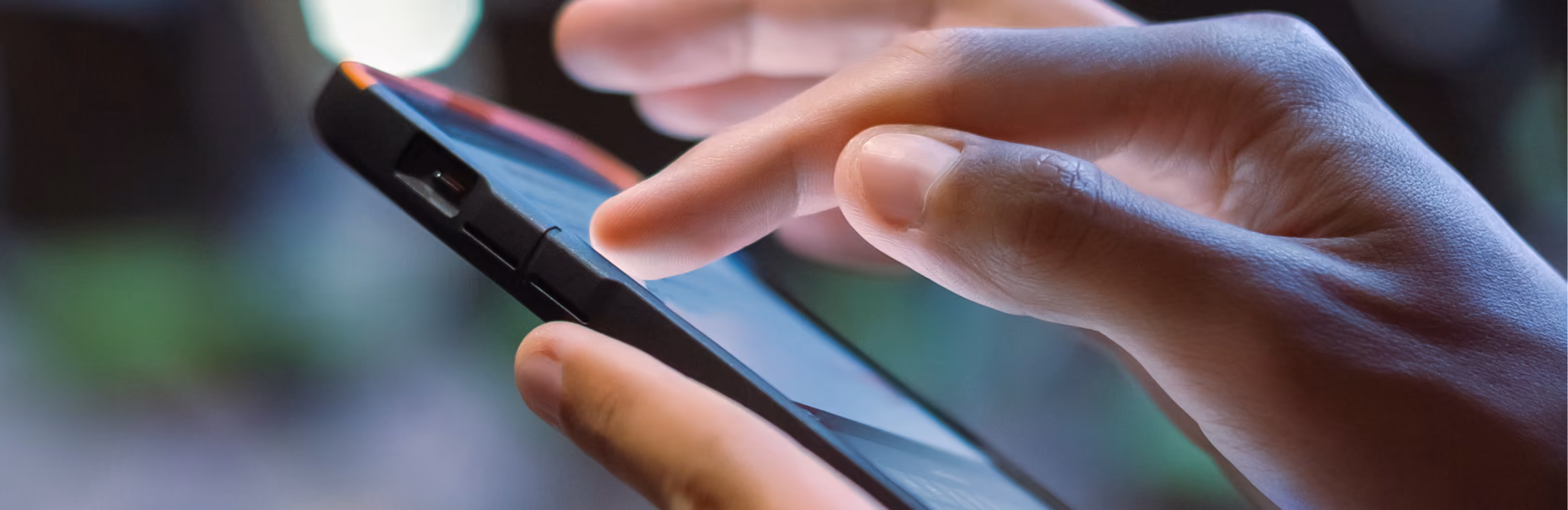 Hand using phone for virtual design consultation