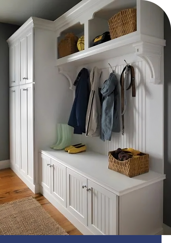 Compact mudroom storage with built-in coat cubbies and drawers
