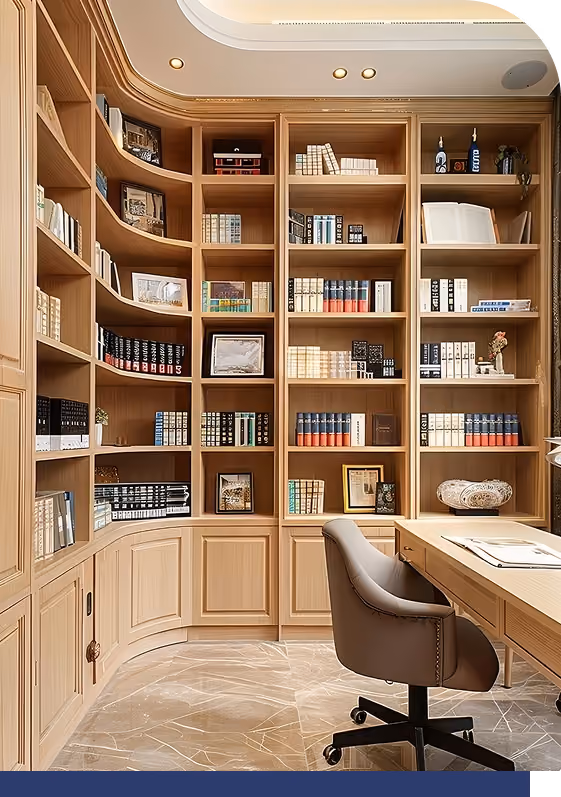 Round bookshelf cabinetry with built-in desk and chair