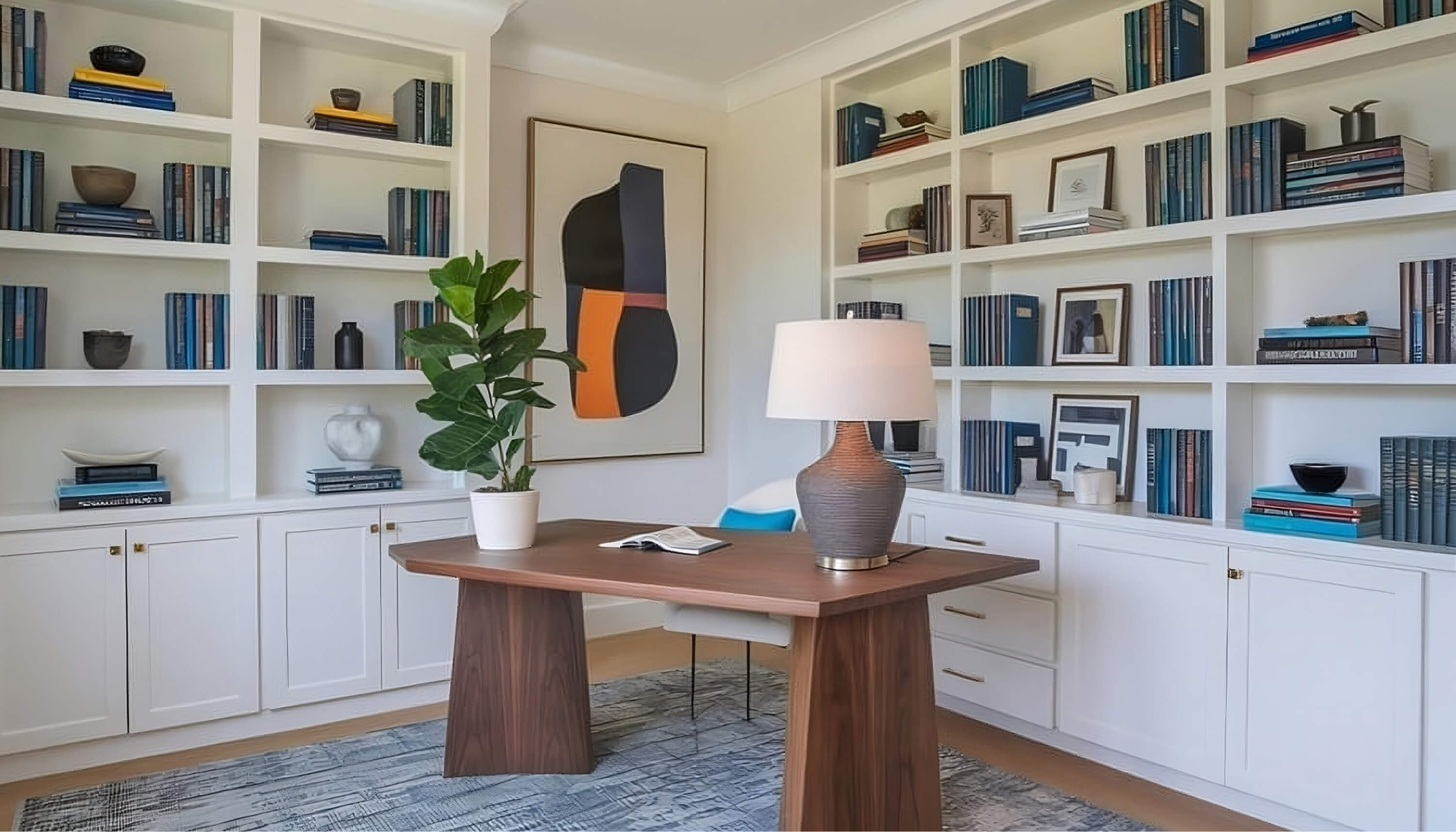 Built-in home office cabinetry with desk and bookshelves