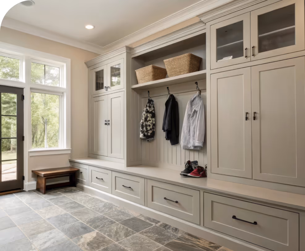 Custom mudroom storage with closed cabinets and open bench