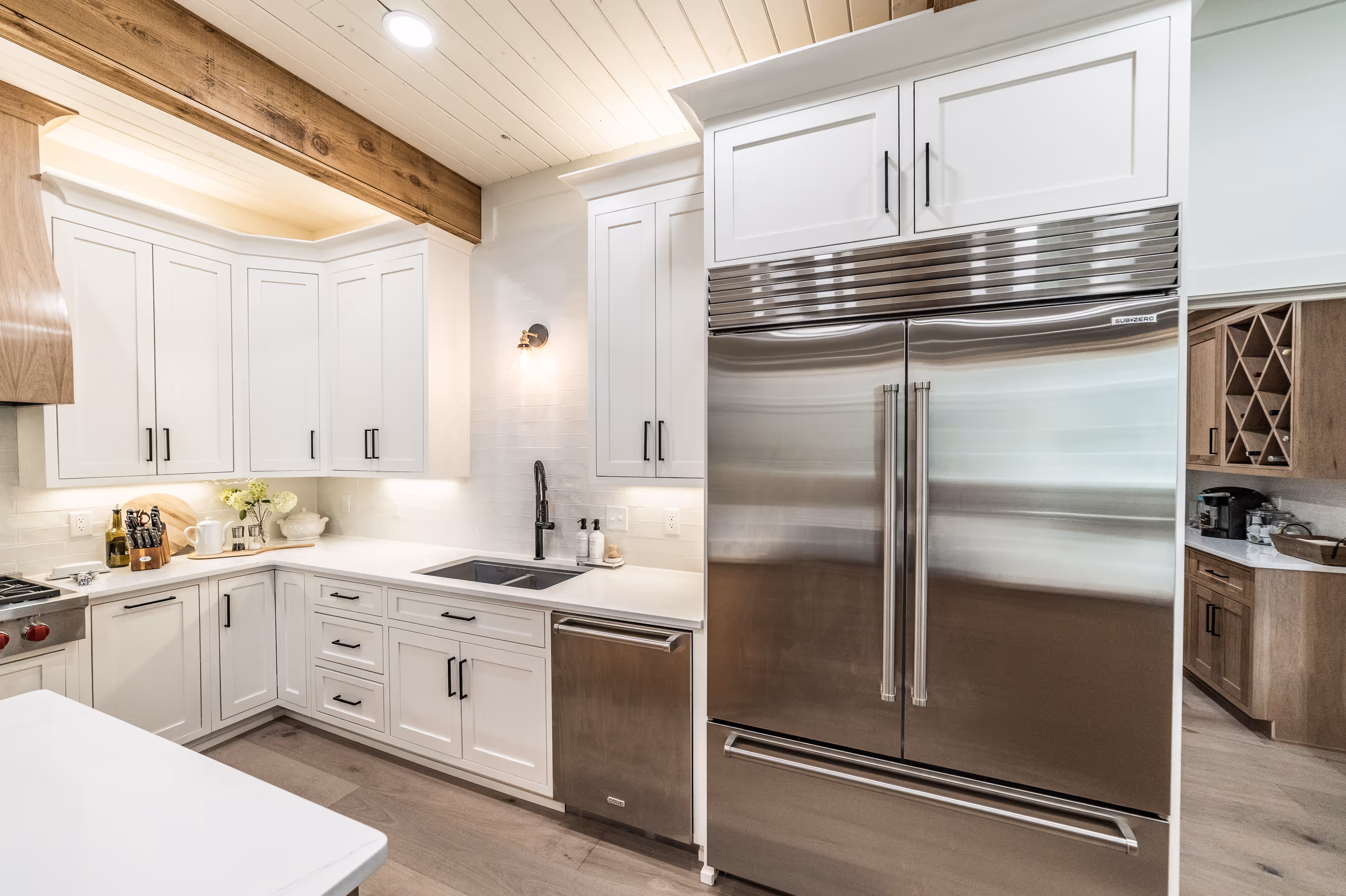 Modern kitchen with custom cabinetry and stainless appliances