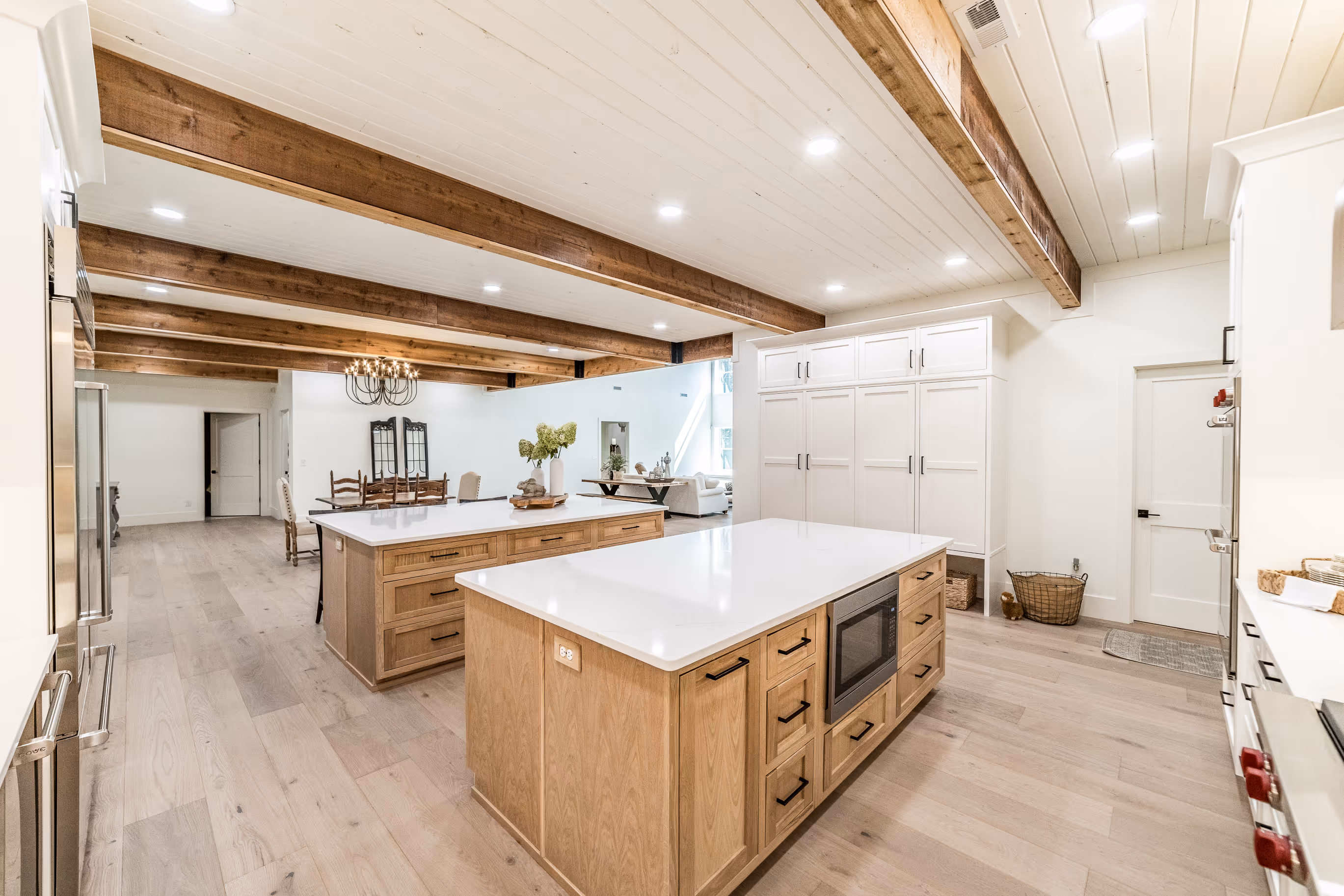 Bright kitchen with double islands and custom cabinetry