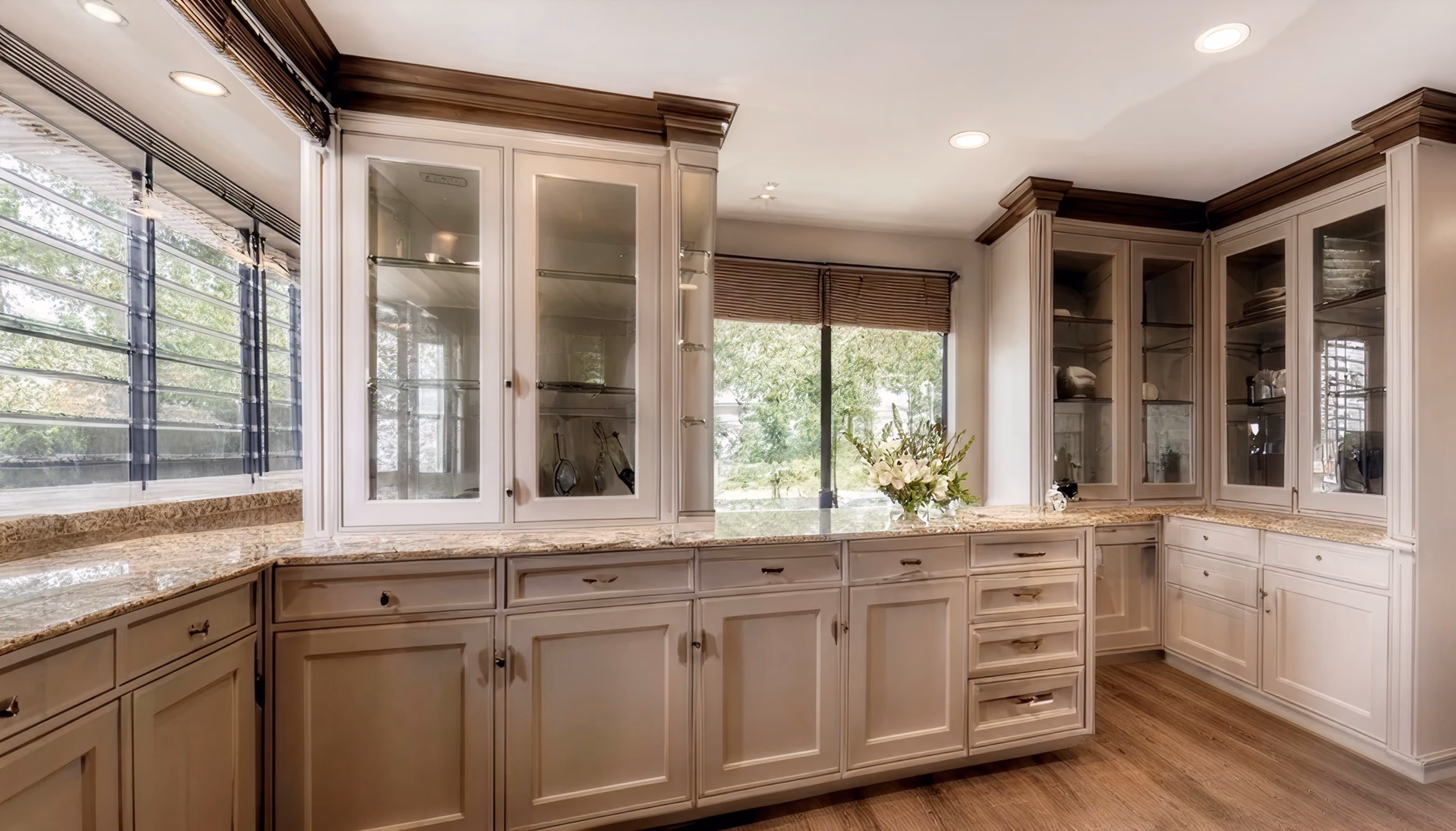 Pantry cabinets with natural wood finish and open shelving