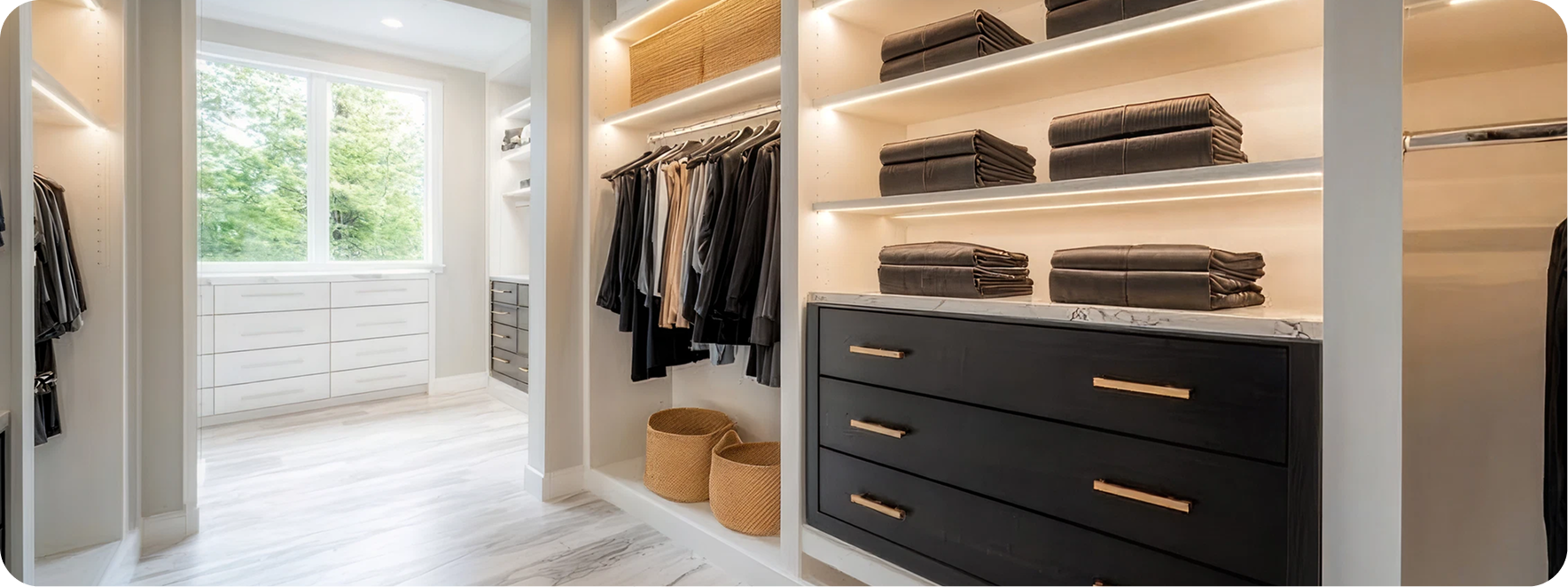 Custom closet cabinets with black drawers and shelving
