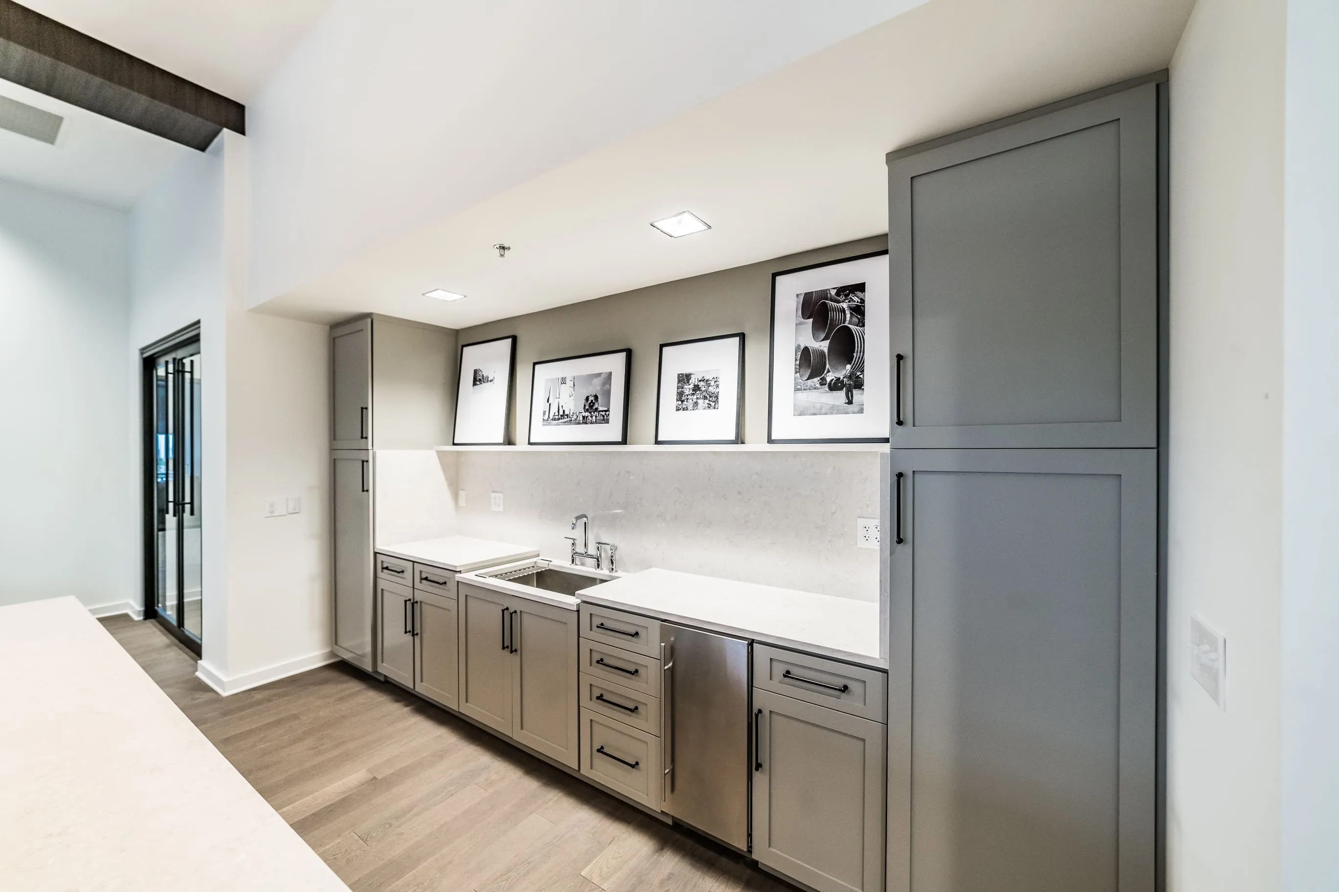 Custom kitchen cabinetry with island and built-in appliances