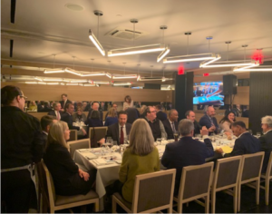 Participants having a discussion at Century Initiative’s report launch dinner