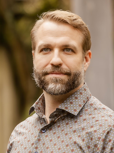 [headshot] image of Casey Paleos