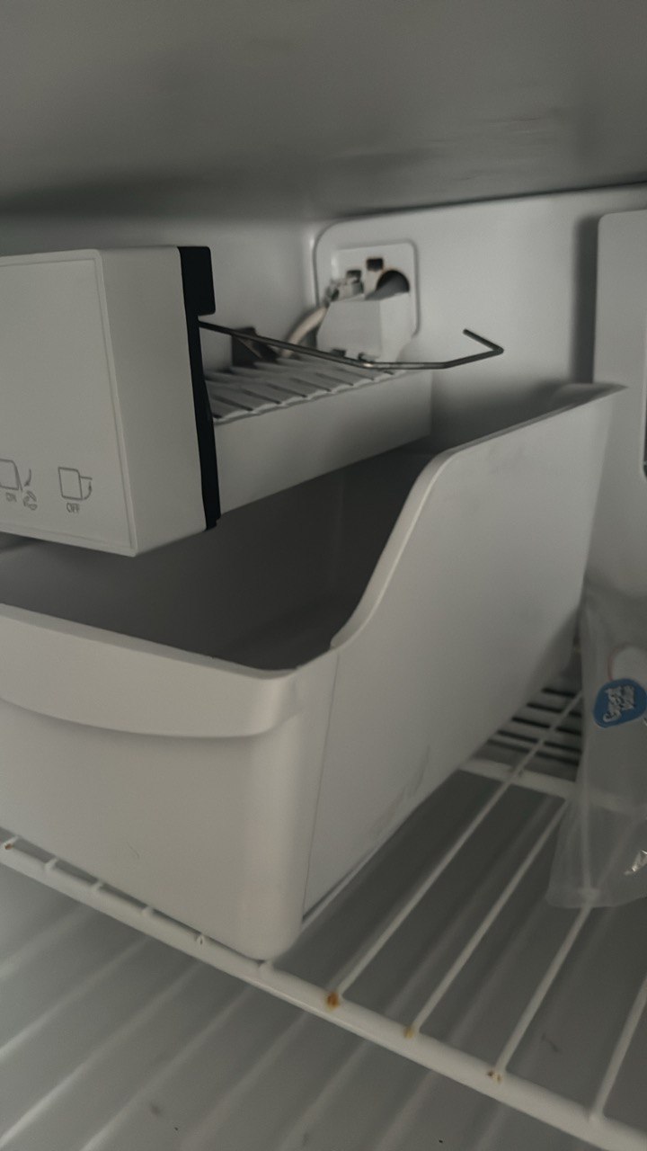 Hand holding a Mercedes car key inside vehicle – Mobile car key replacement service in Columbus, OH