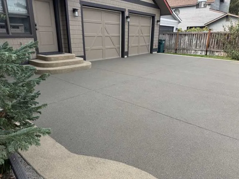 Beautifully resurfaced driveway in Spokane, showcasing the benefits of professional work