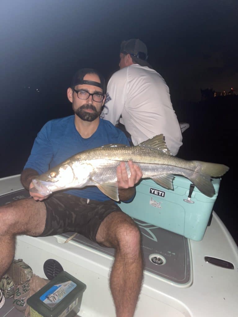 Photo of Michael Cardinale holding a large fish