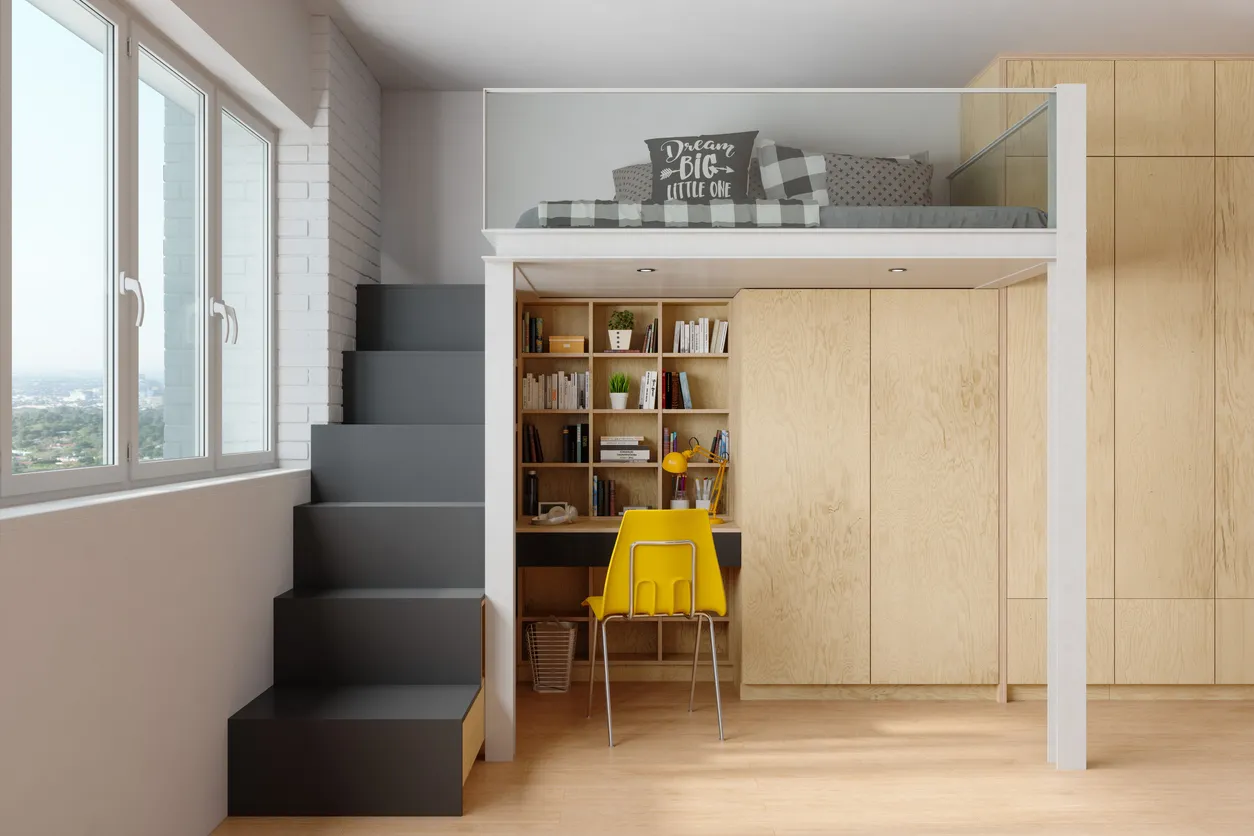 Space-maximizing condo storage solutions with hidden cabinetry, built-in desk area, and flexible layout design in Ontario