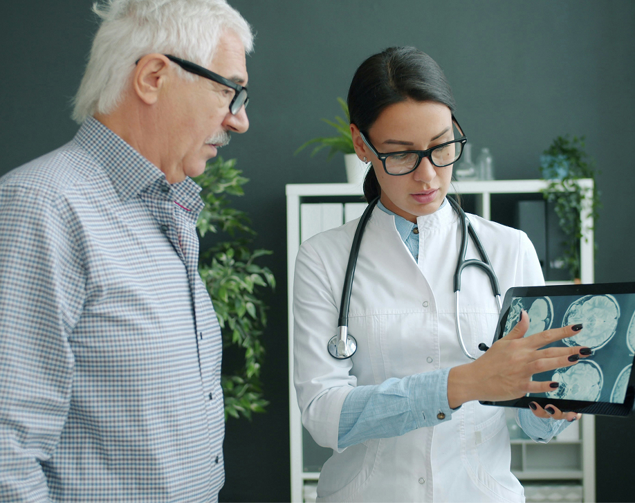 Doctor showing a patient results on an ipad