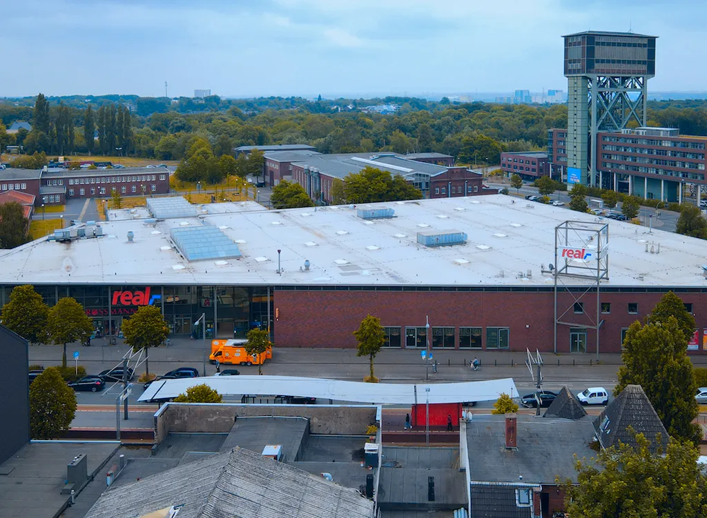 Verwaltete Immobilie eines REAL-Einkaufscenters